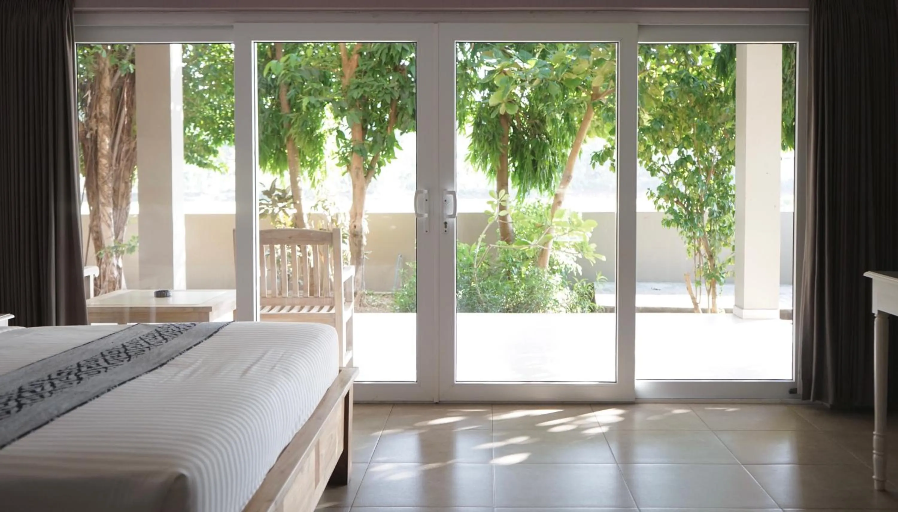 View (from property/room), Bed in Coconut Lodge Resort