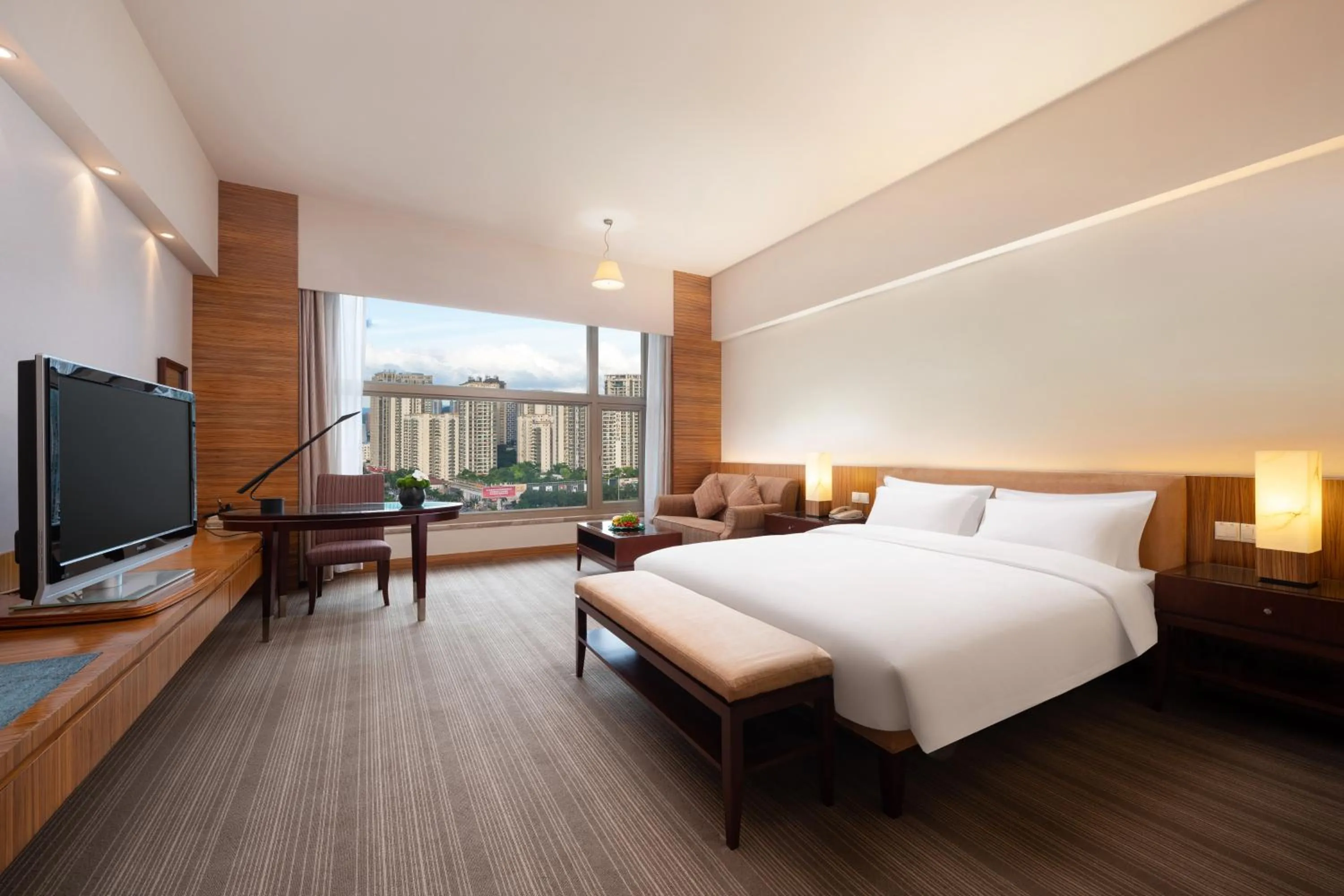 Bed in Parklane Hotel Changan