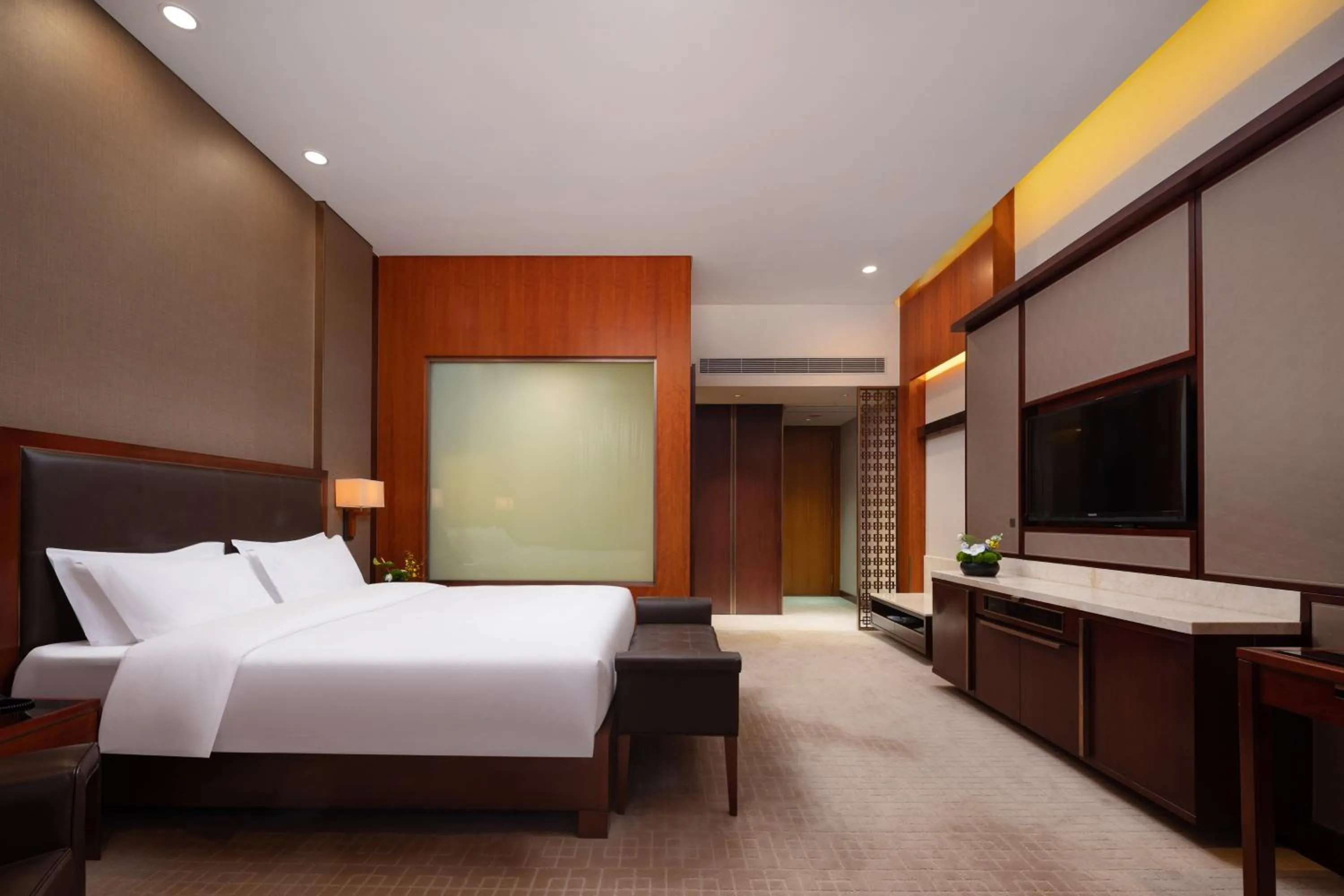 Bed in Parklane Hotel Changan