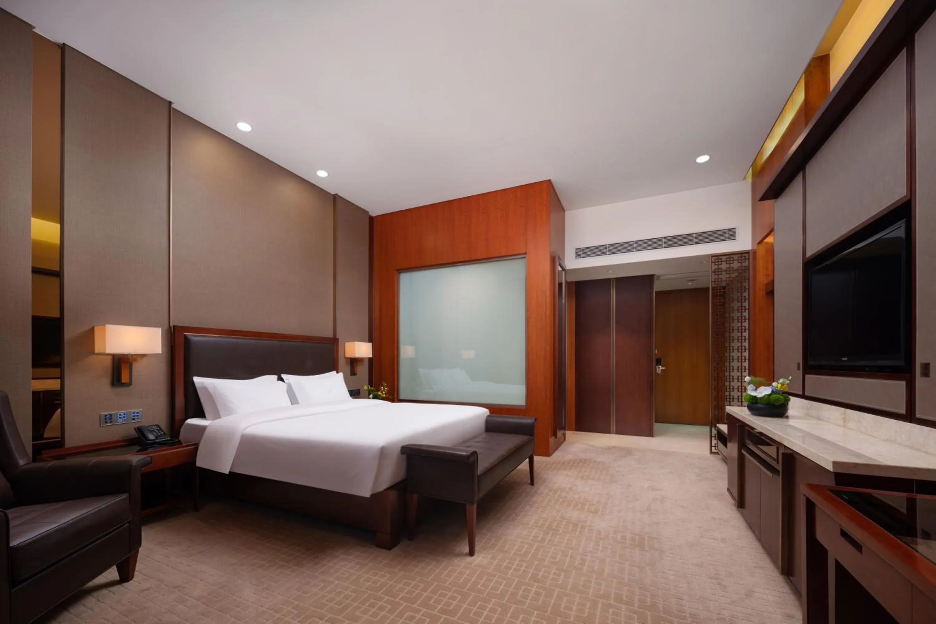 Bed in Parklane Hotel Changan