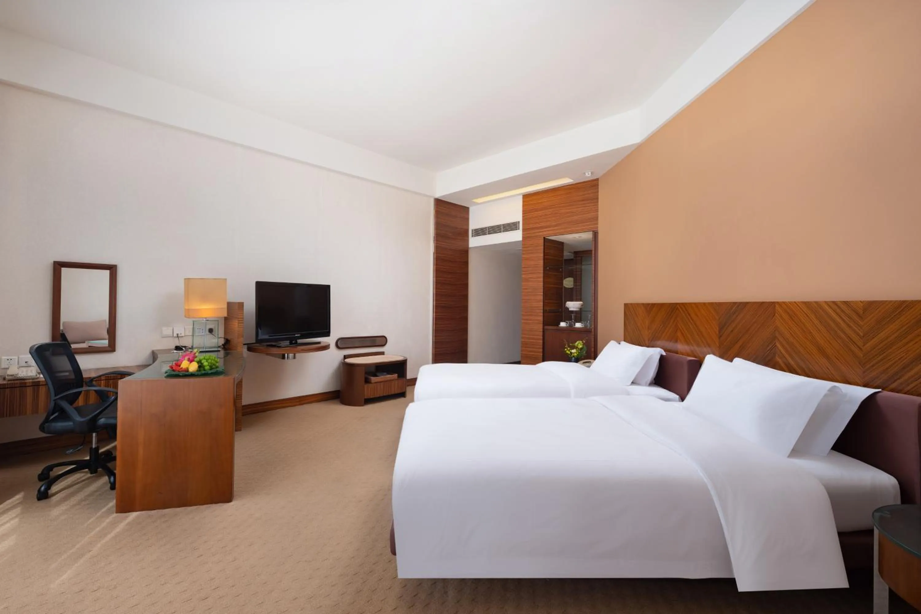 Bed in Parklane Hotel Changan