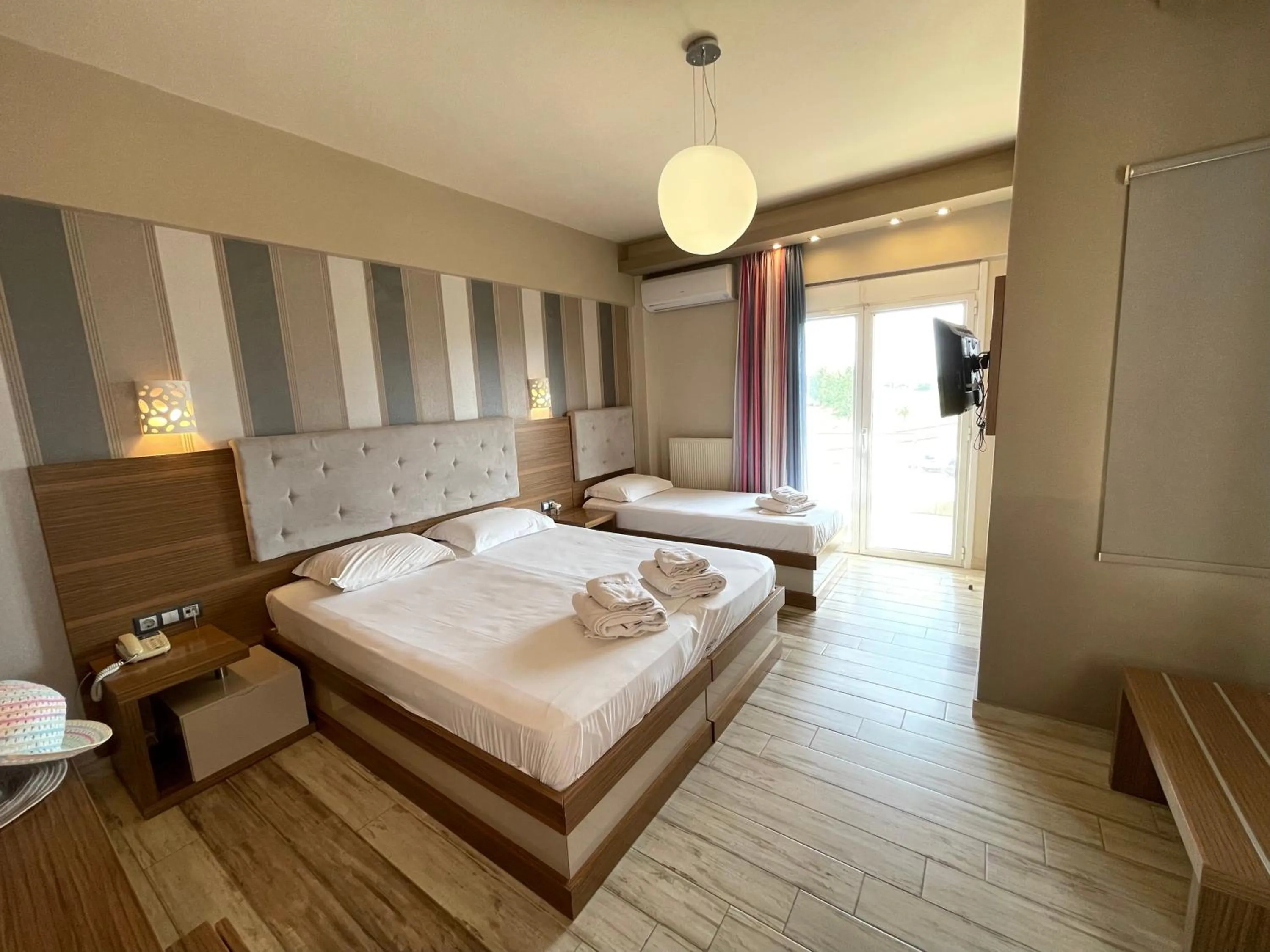 Bed in Porto Del Sol Hotel