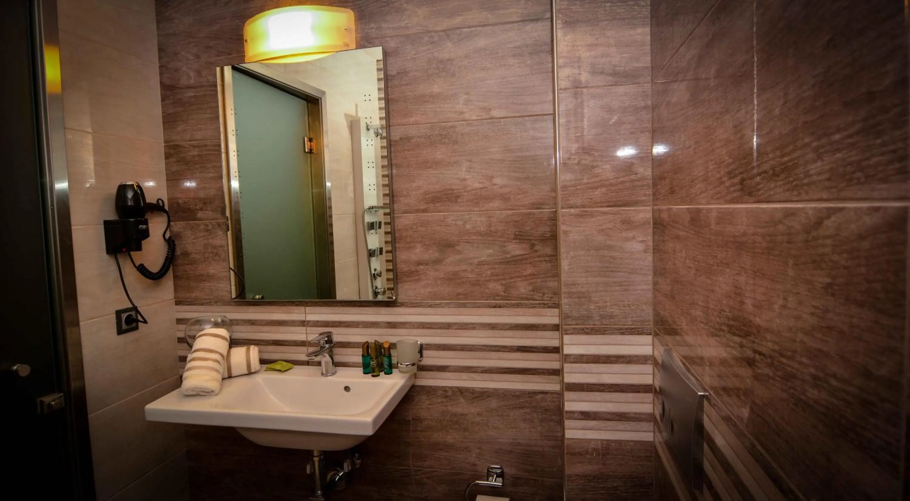 Bathroom in Porto Del Sol Hotel