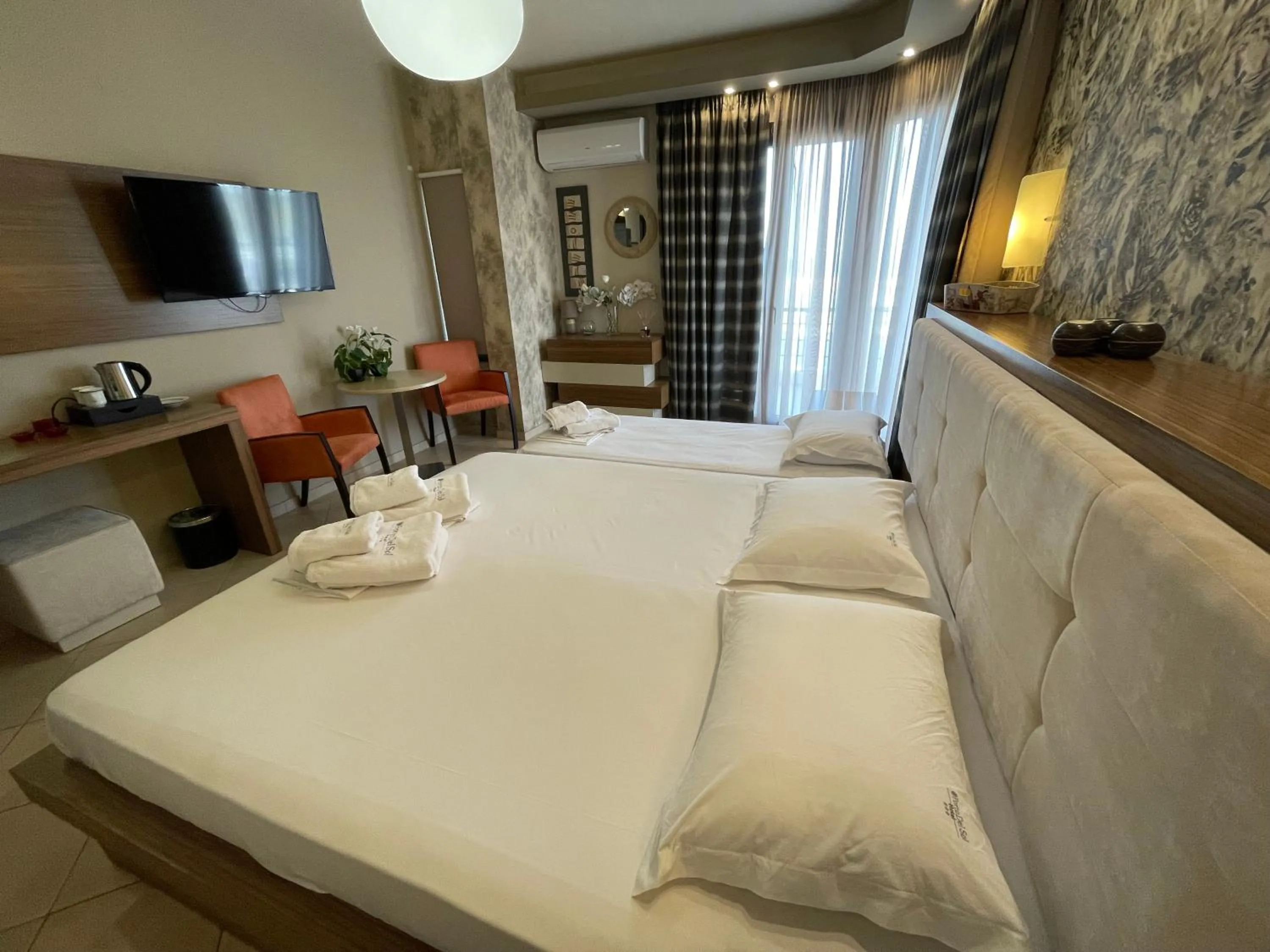 Bed in Porto Del Sol Hotel
