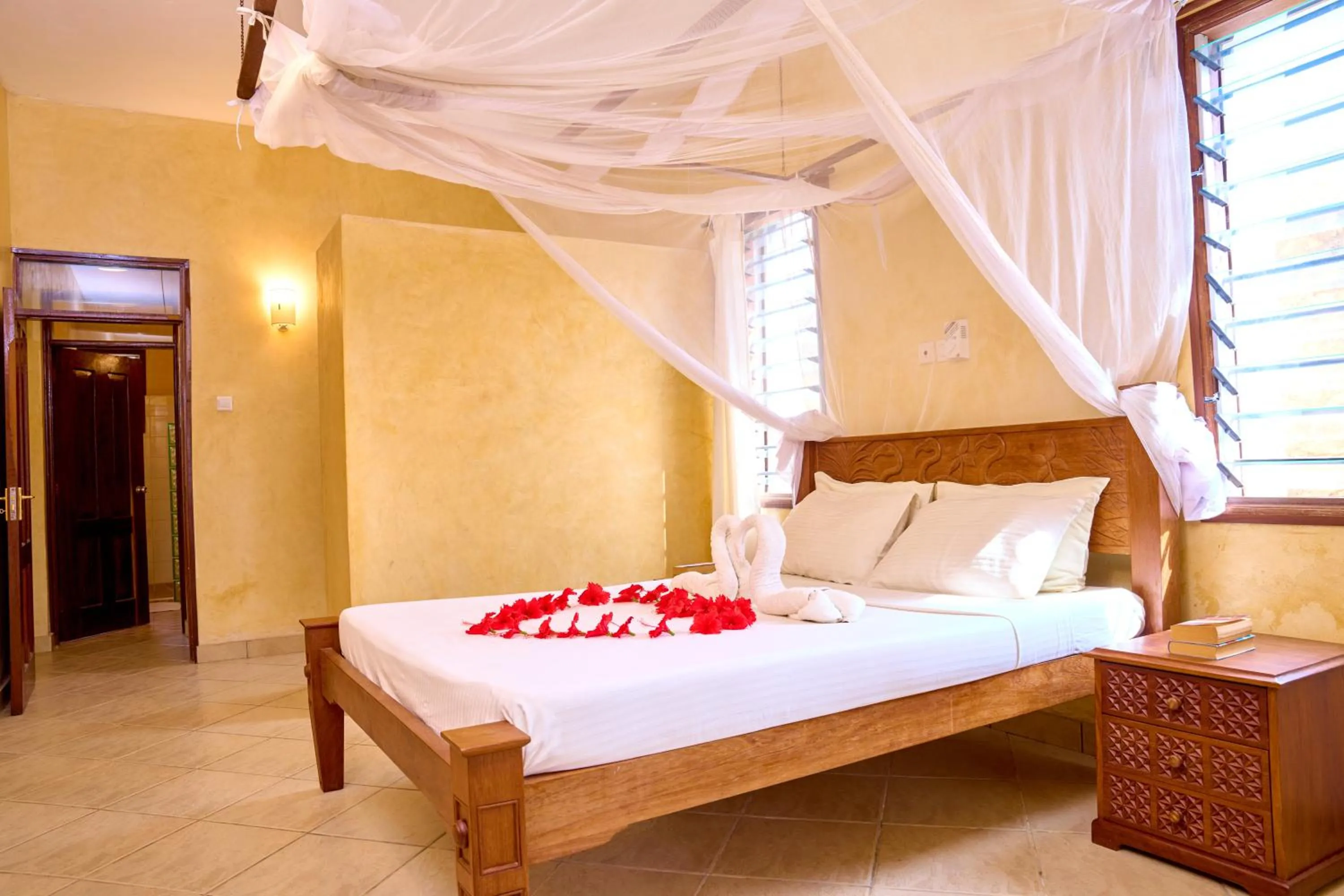 Photo of the whole room, Bed in Flametree Beach Homes