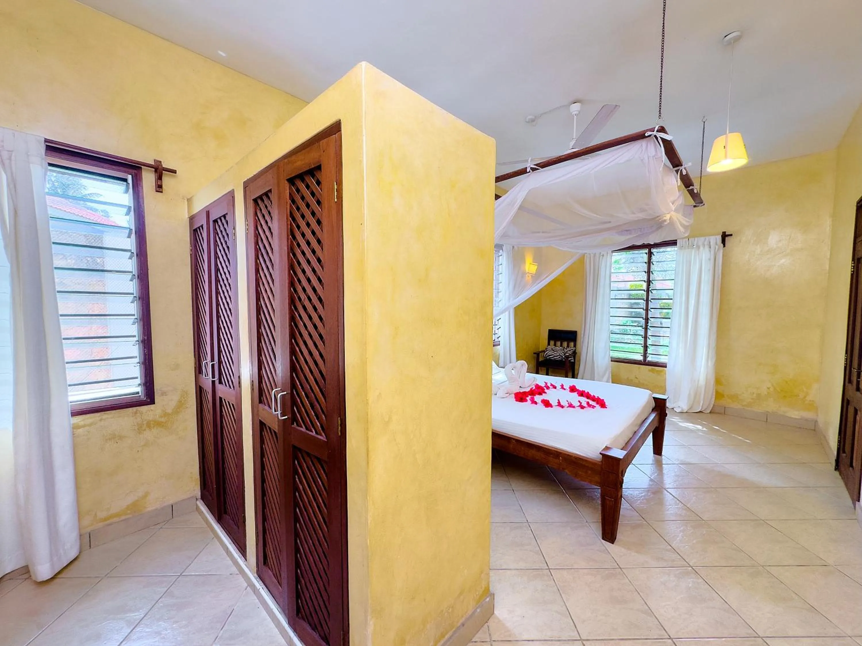 Bed in Flametree Beach Homes