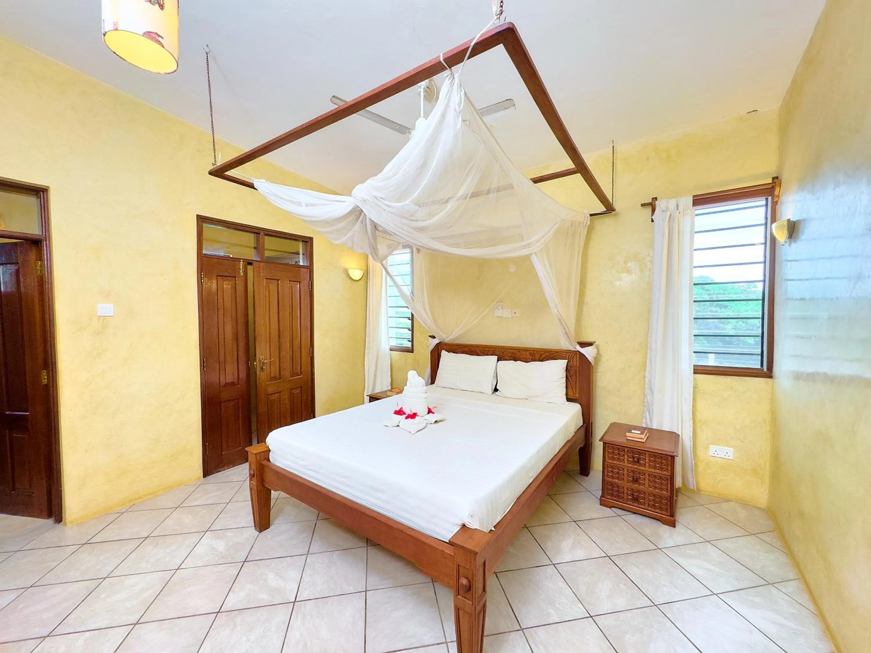 Bed in Flametree Beach Homes