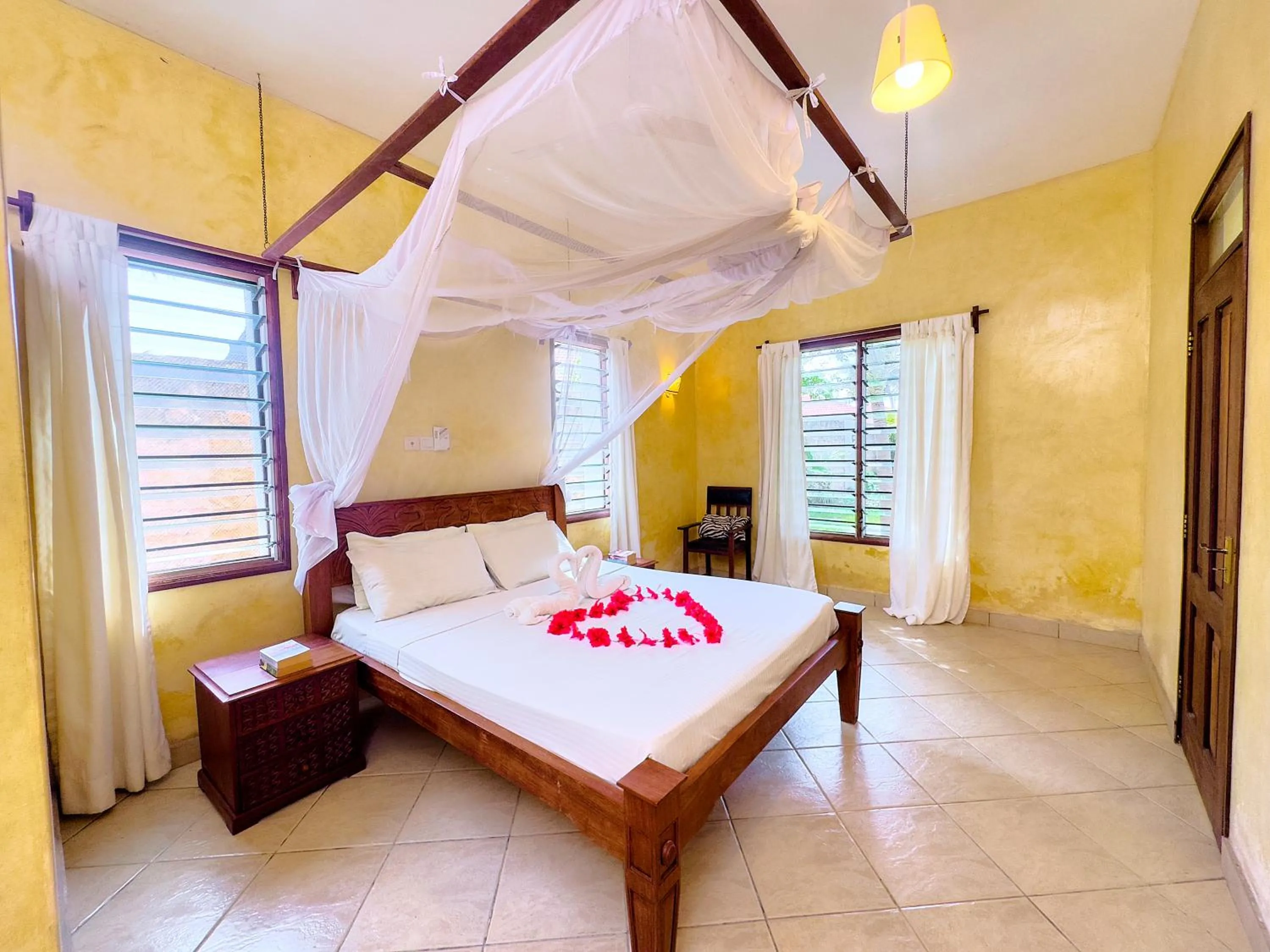 Photo of the whole room, Bed in Flametree Beach Homes