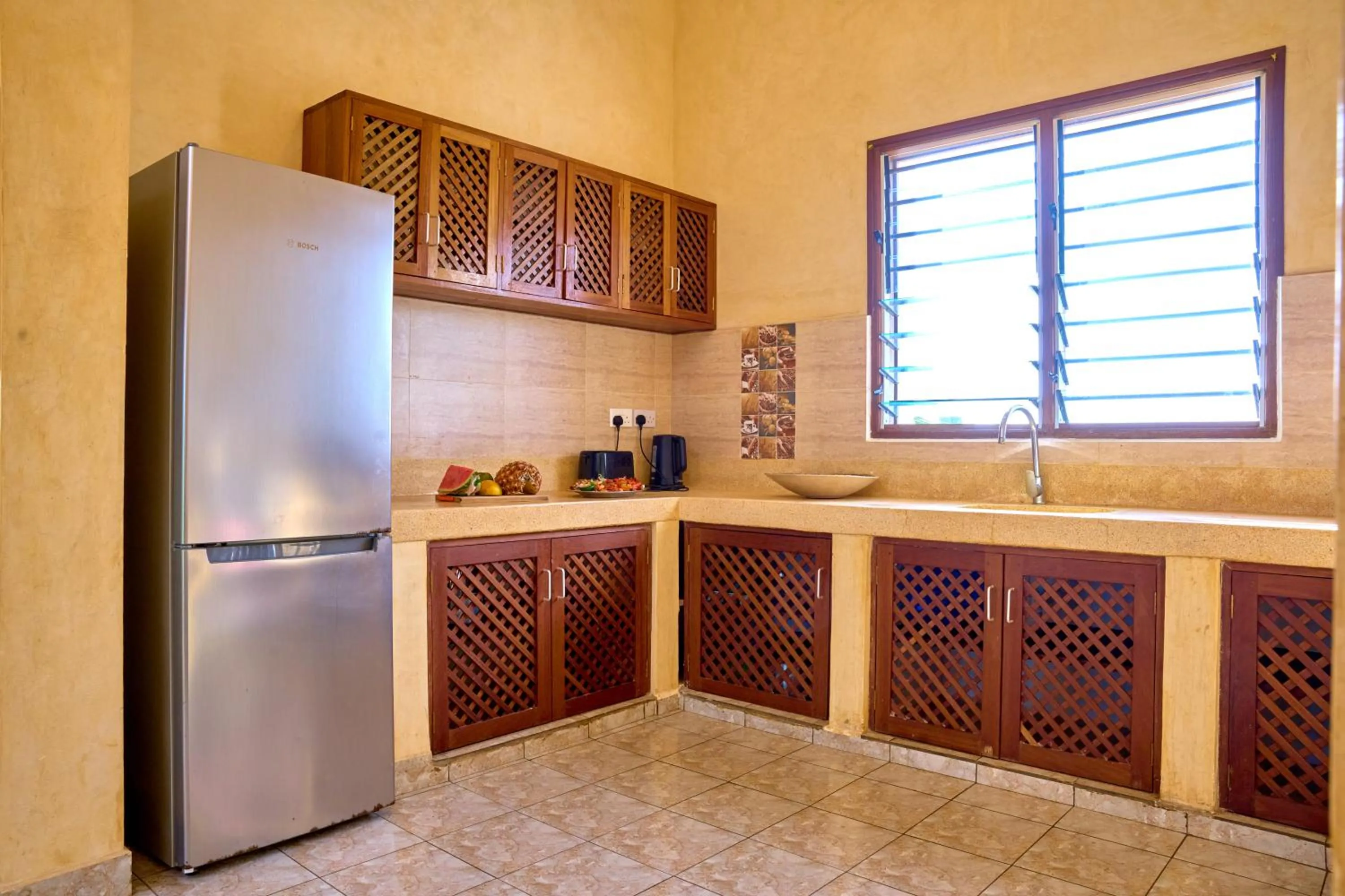Kitchen or kitchenette in Flametree Beach Homes