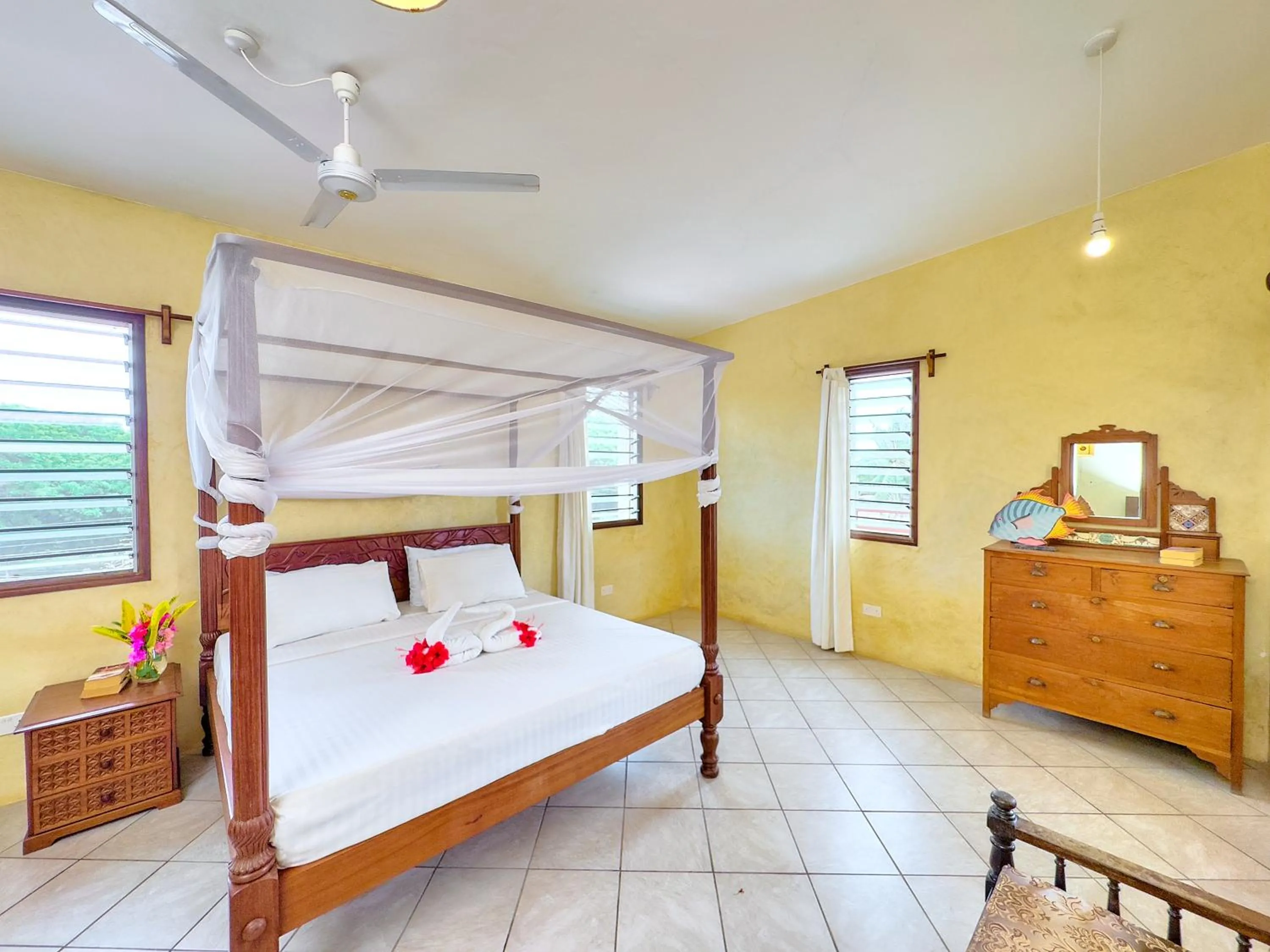Bed in Flametree Beach Homes