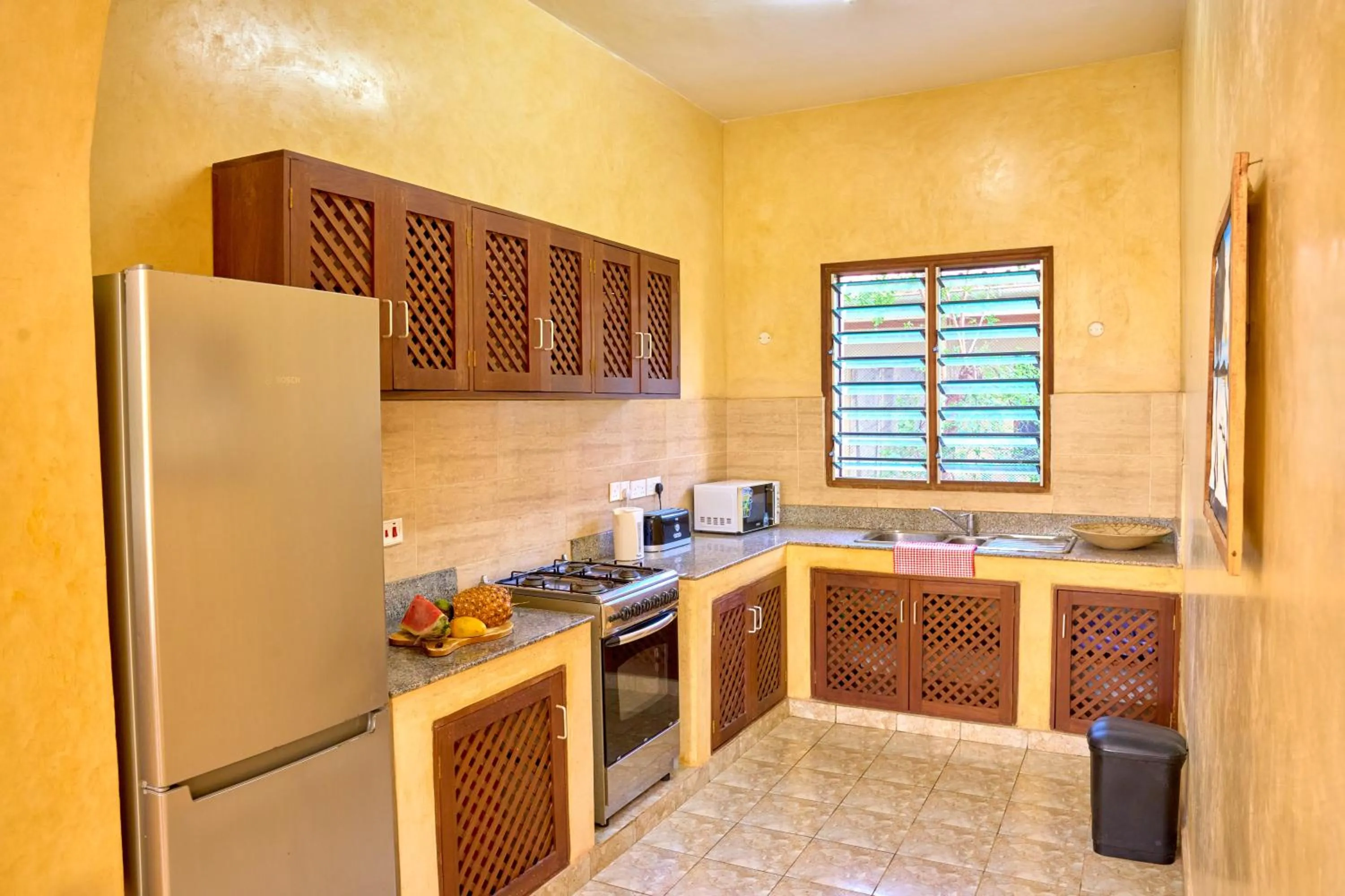 Kitchen or kitchenette in Flametree Beach Homes