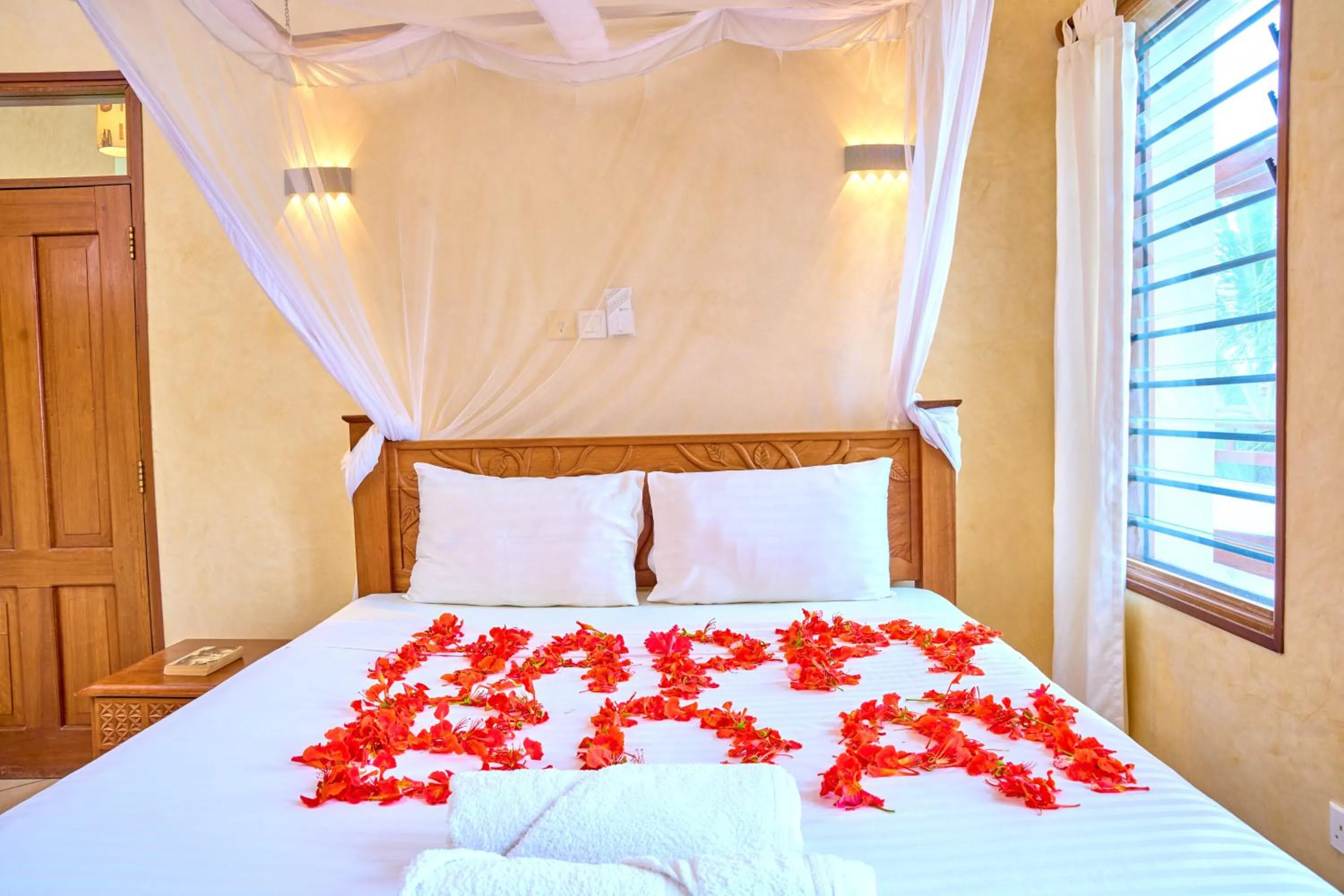 Bed in Flametree Beach Homes