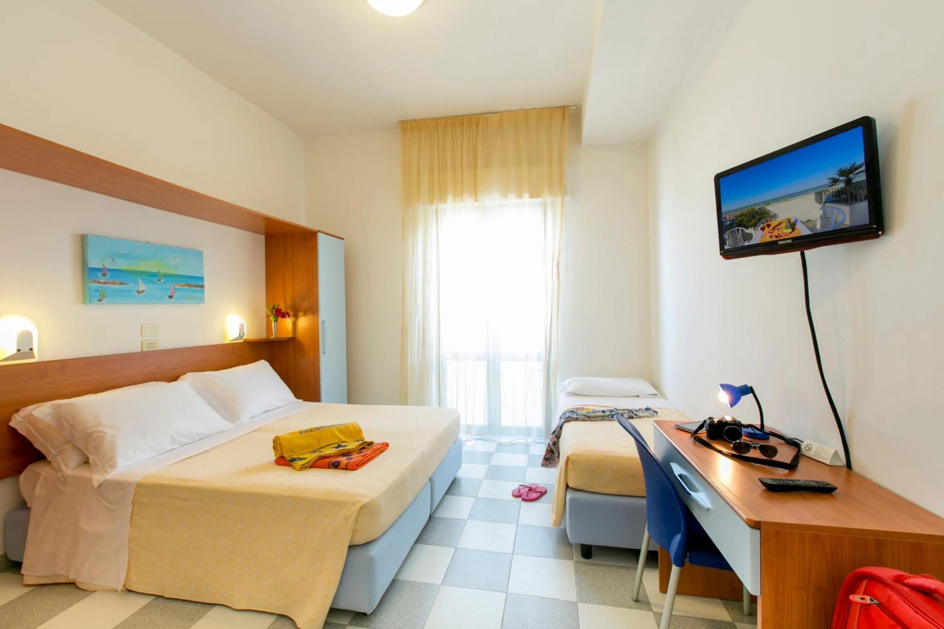 Photo of the whole room, Bed in Residence Sunrise