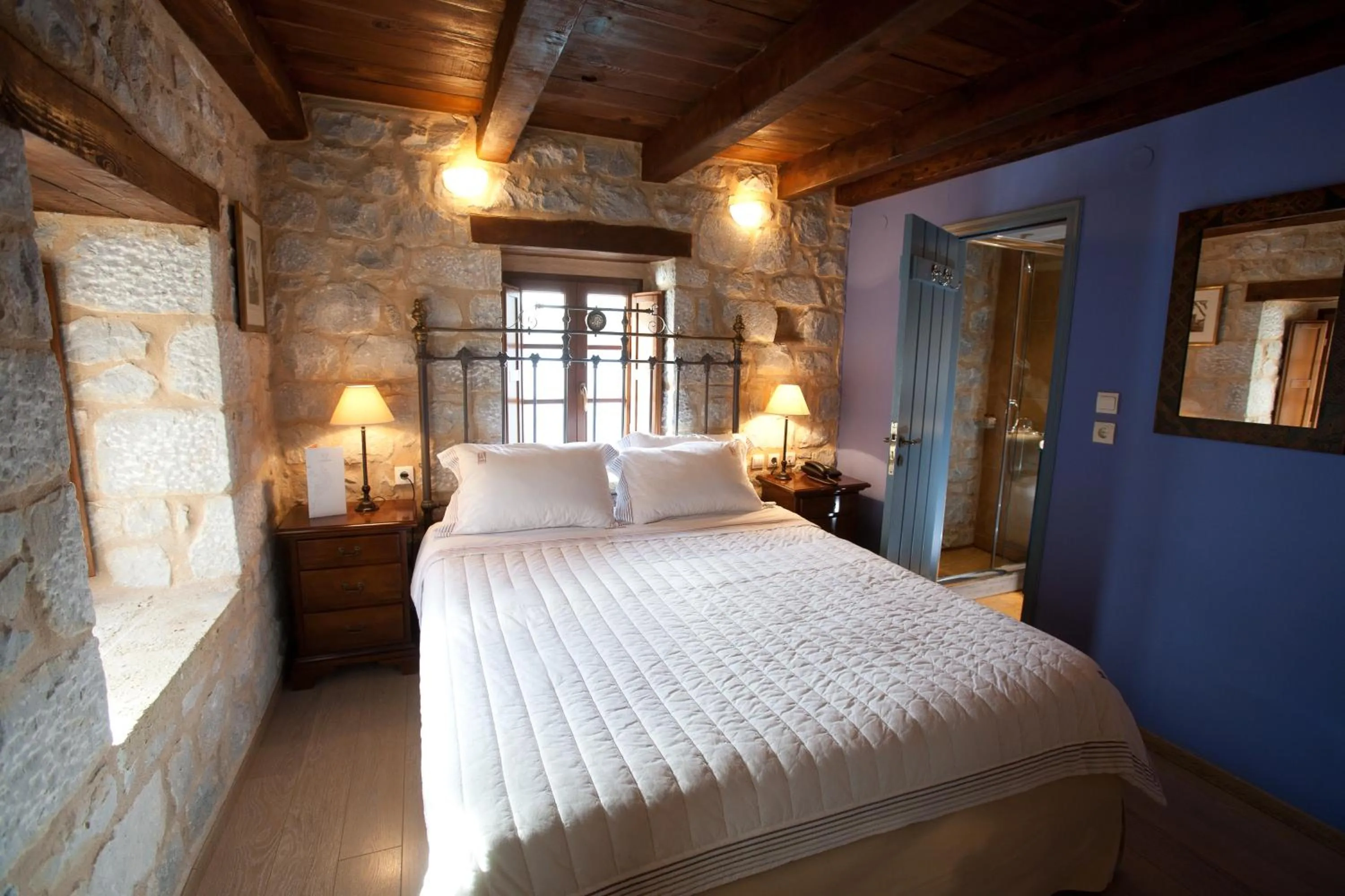Photo of the whole room, Bed in Mavromichalai
