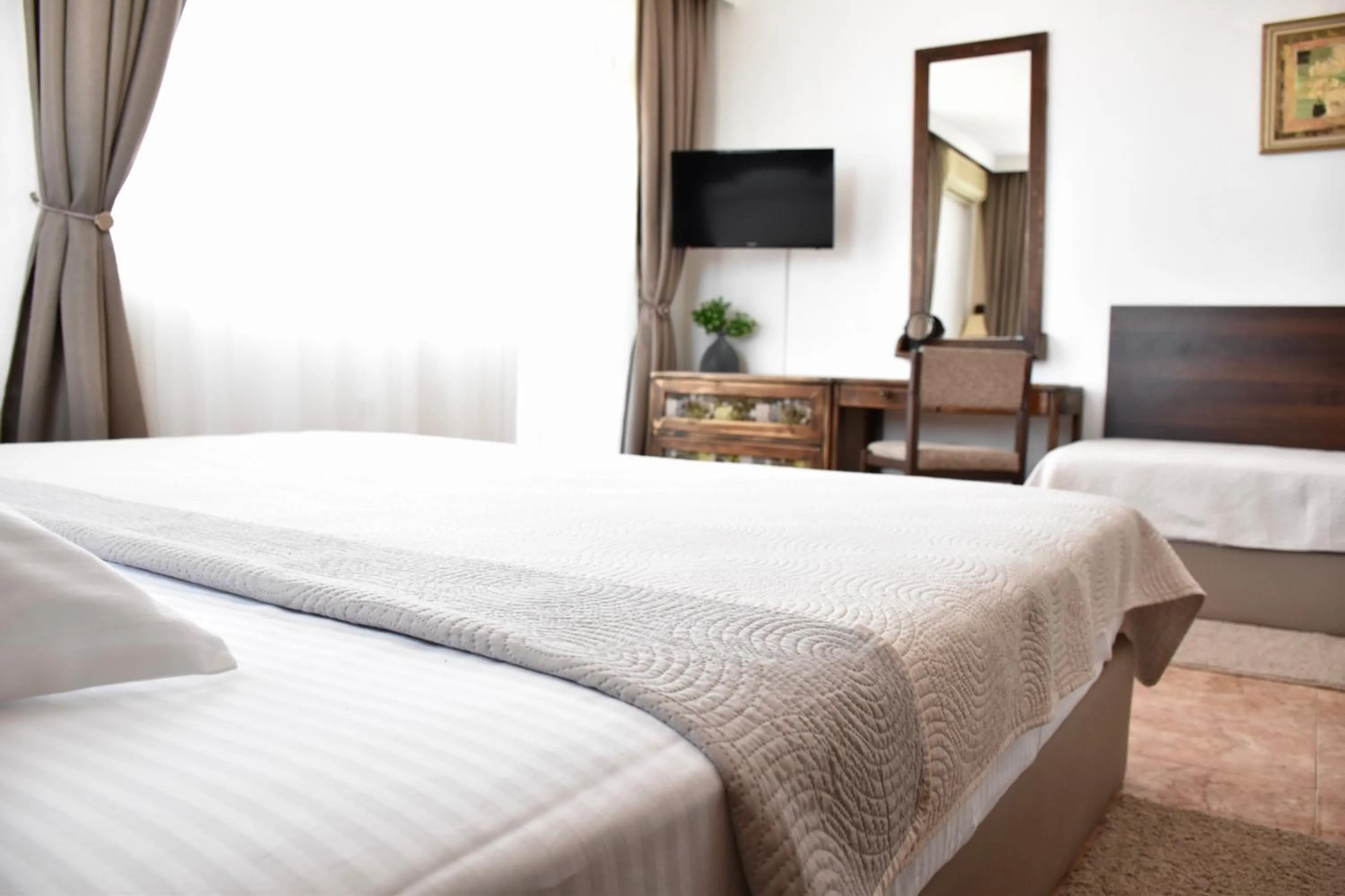 Bed in Family Hotel Apolonia
