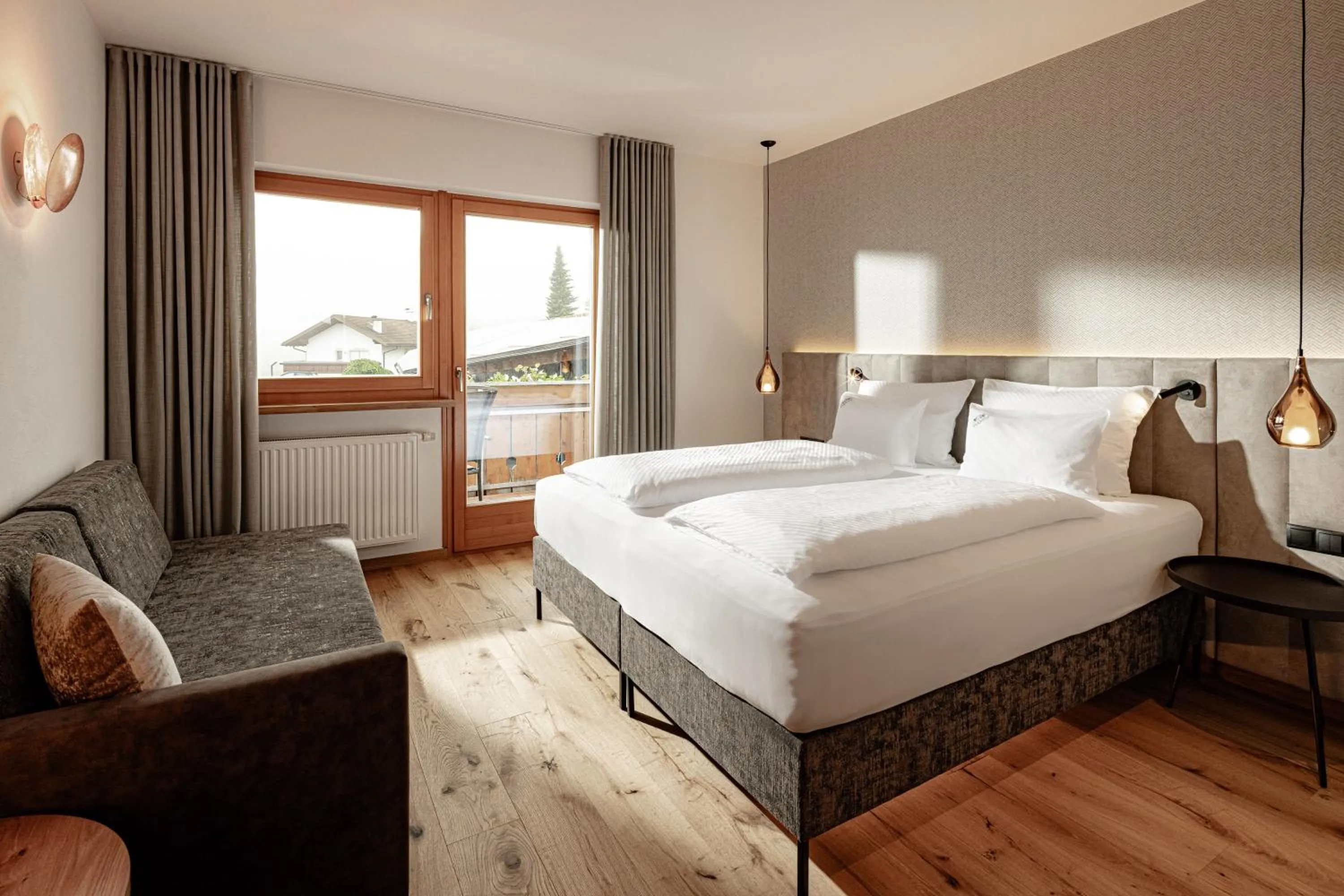 Photo of the whole room, Bed in Panoramahotel Huberhof