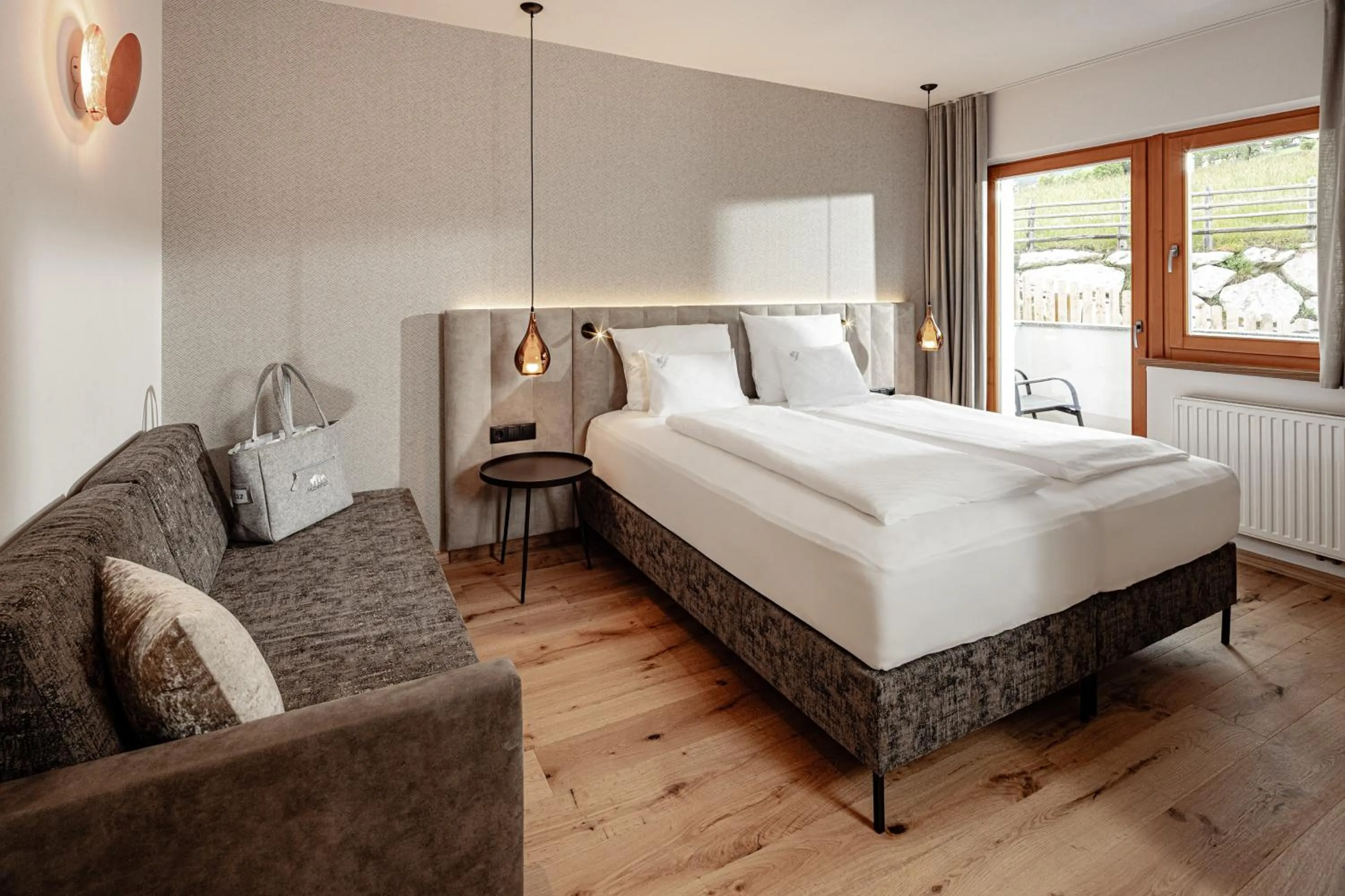 Photo of the whole room, Bed in Panoramahotel Huberhof