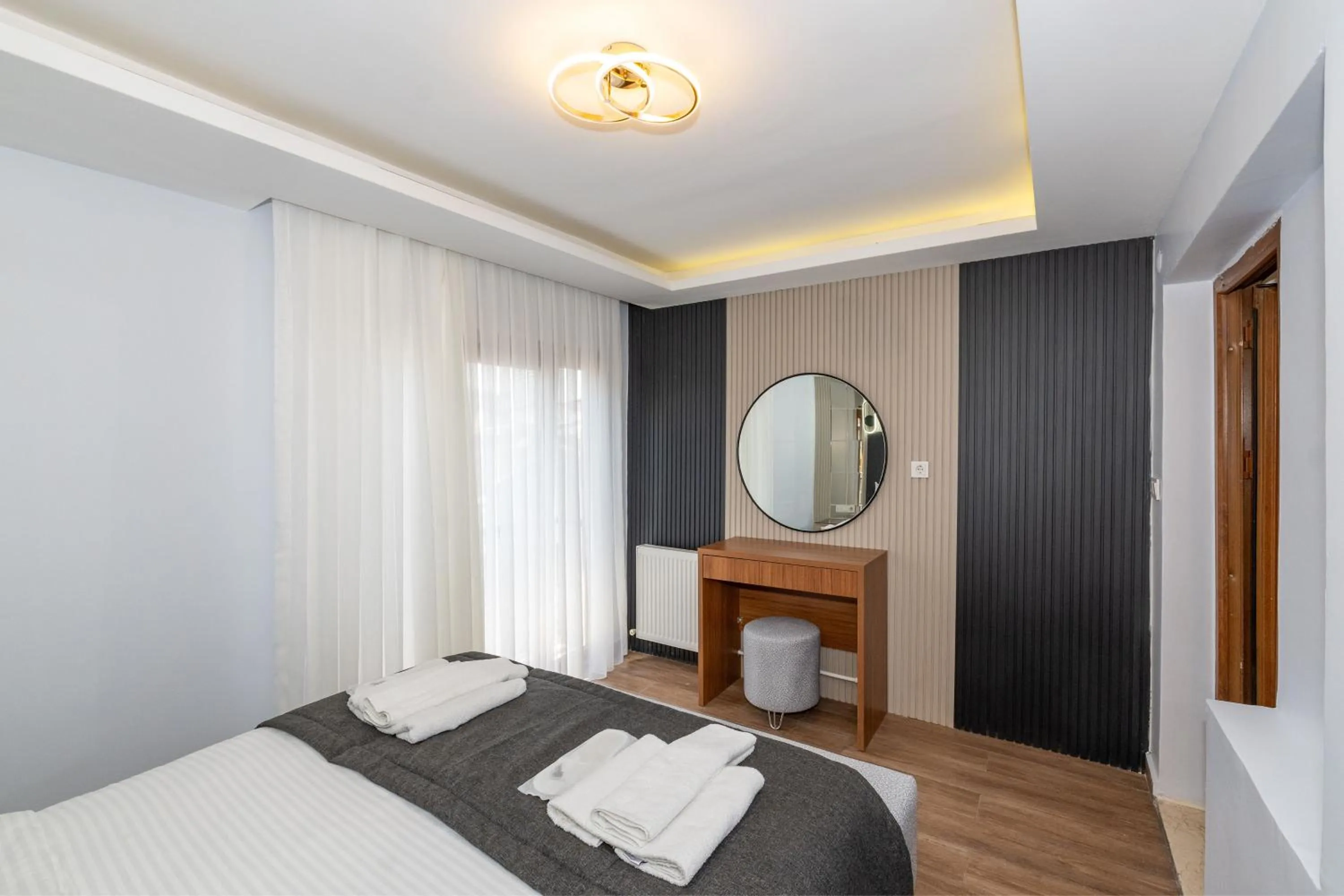 Bed in T-Square Residence