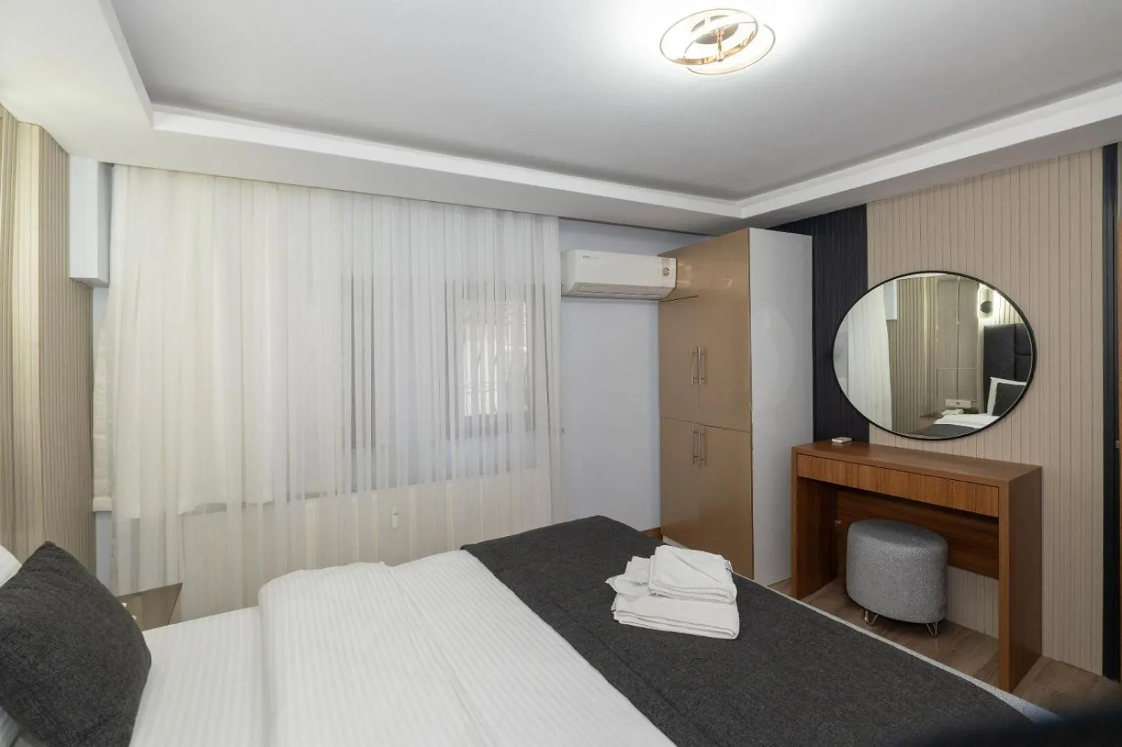 Bed in T-Square Residence