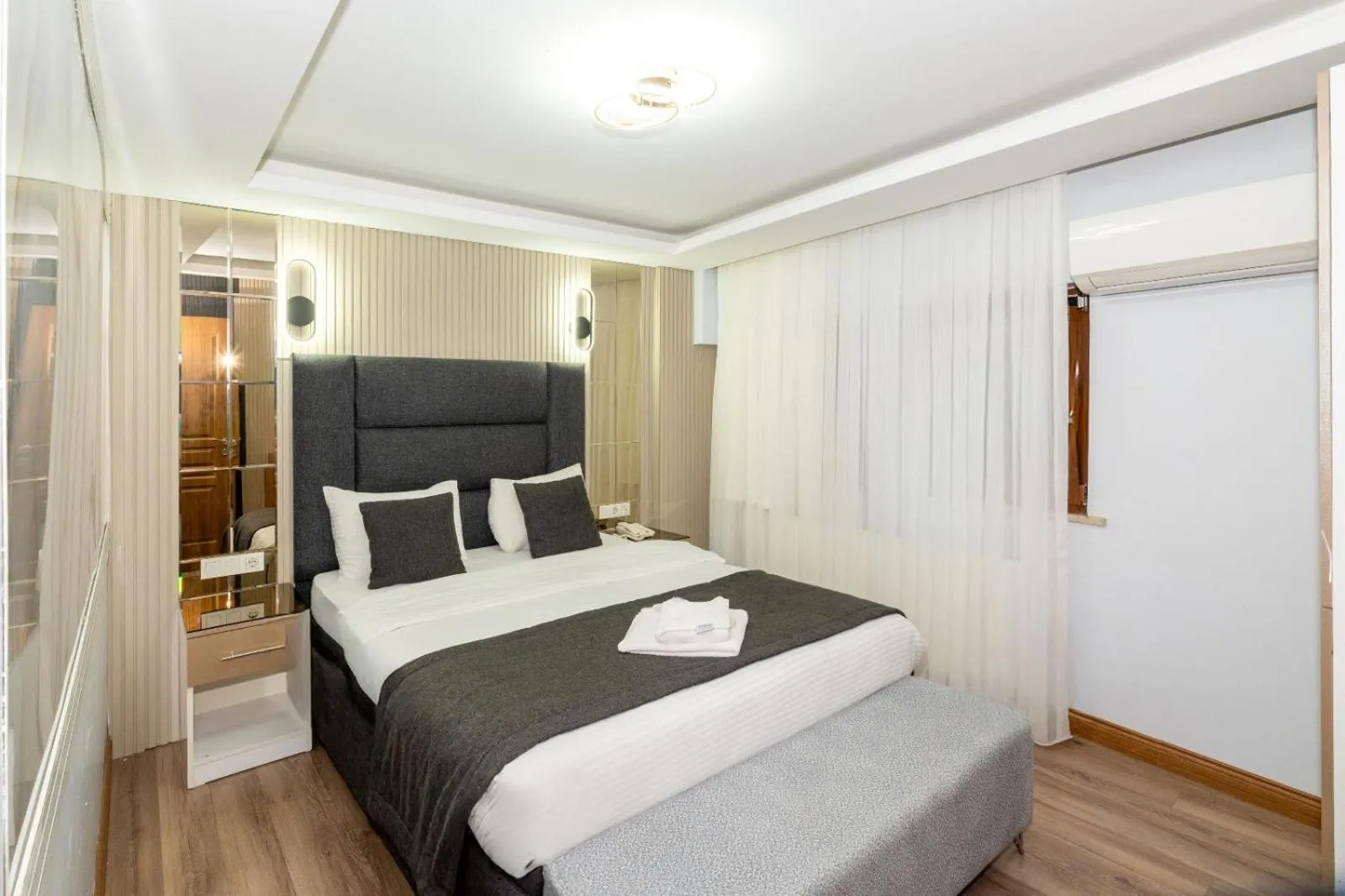 Bed in T-Square Residence