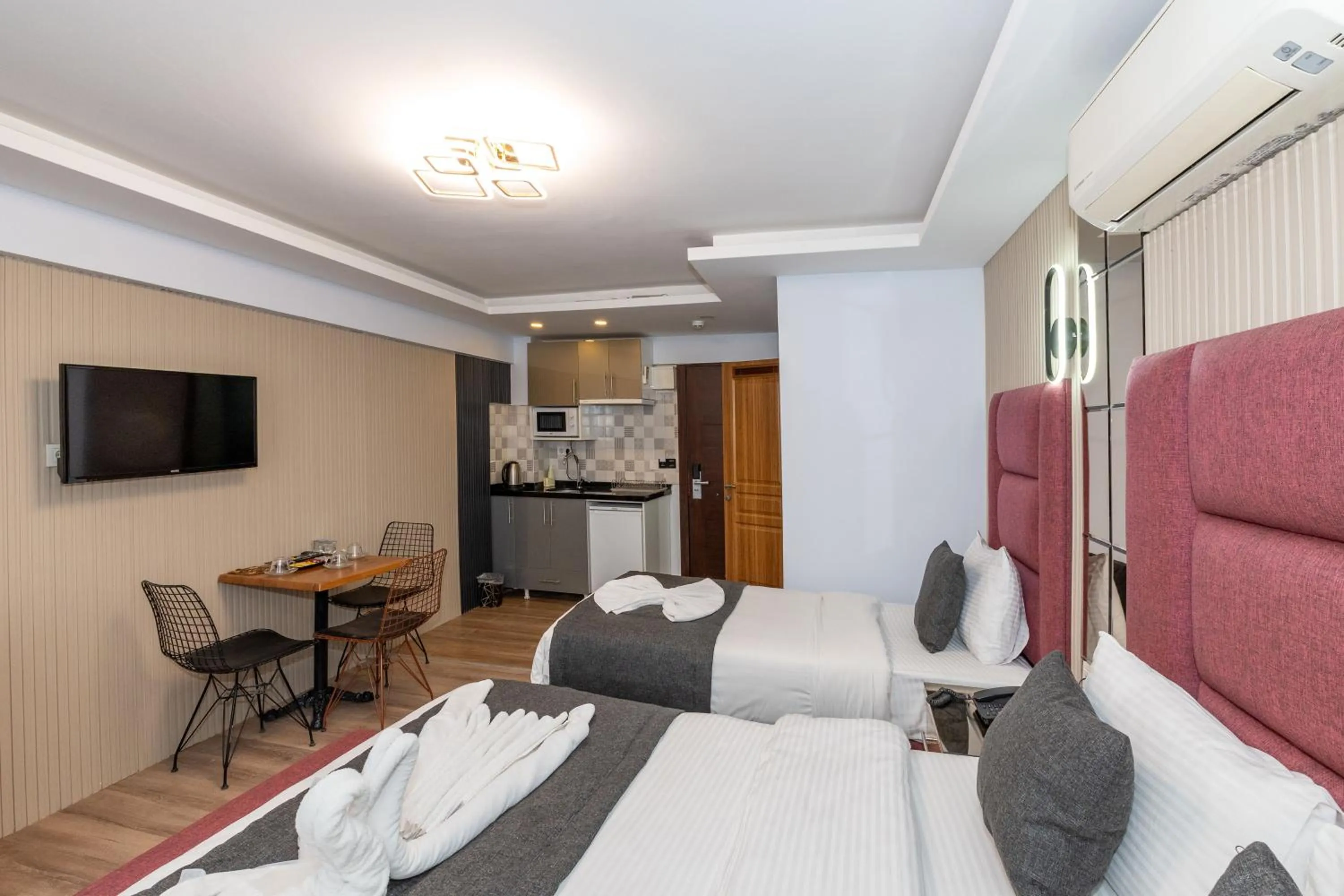 Bed in T-Square Residence