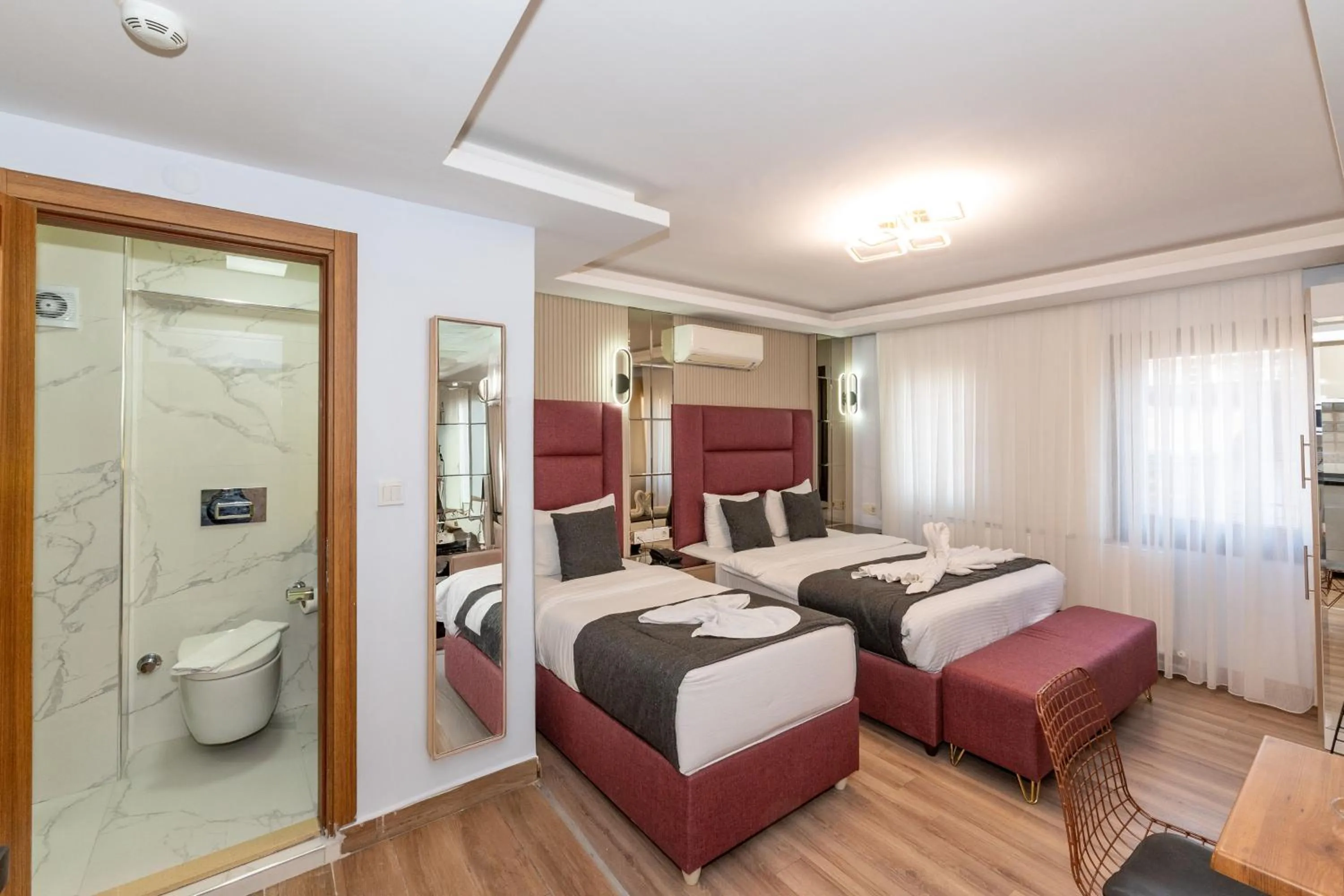 Shower, Bed in T-Square Residence