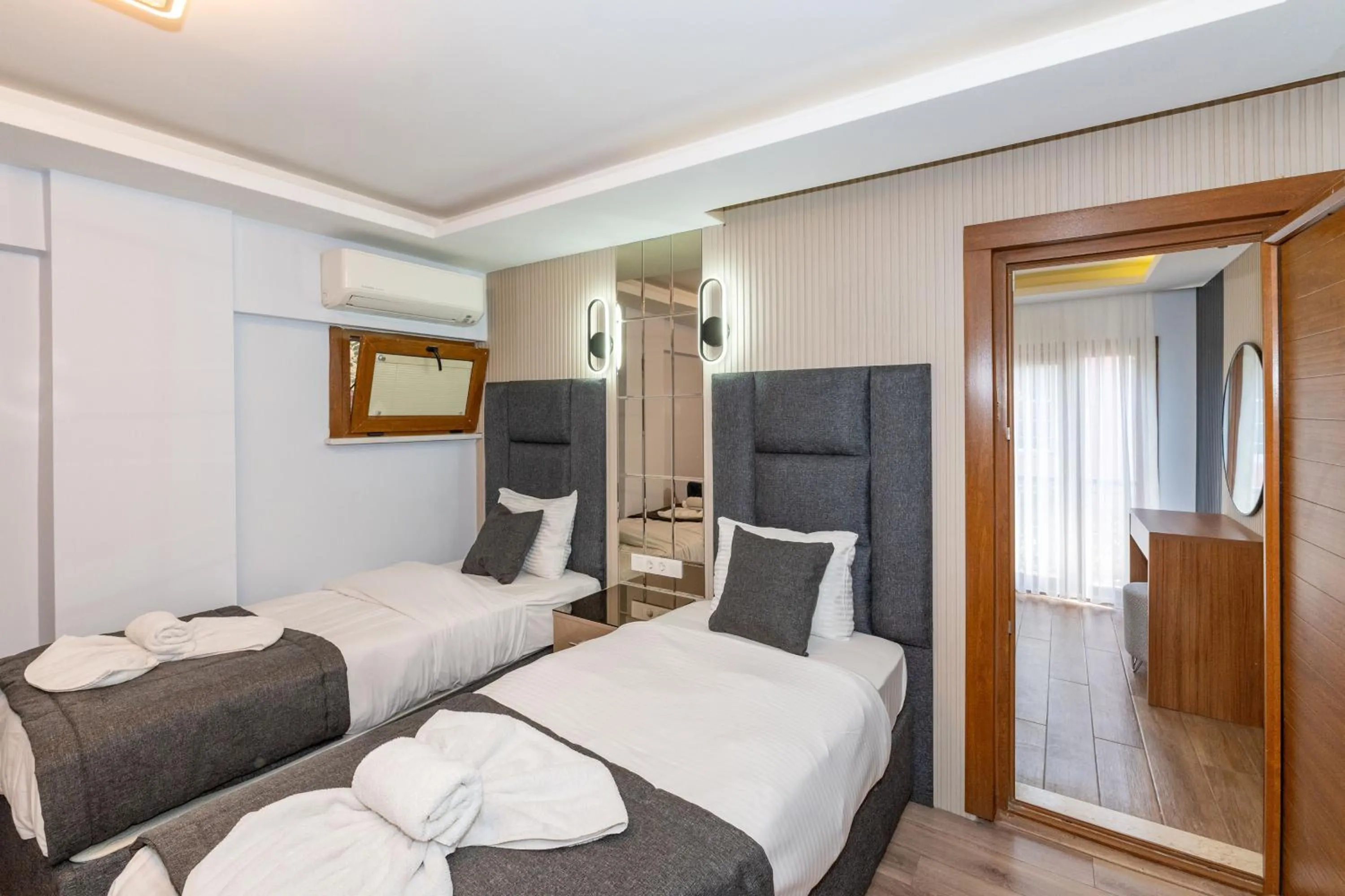 Bed in T-Square Residence