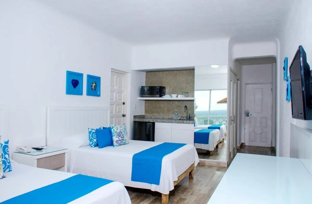 Bed in BSEA Cancun Plaza Hotel