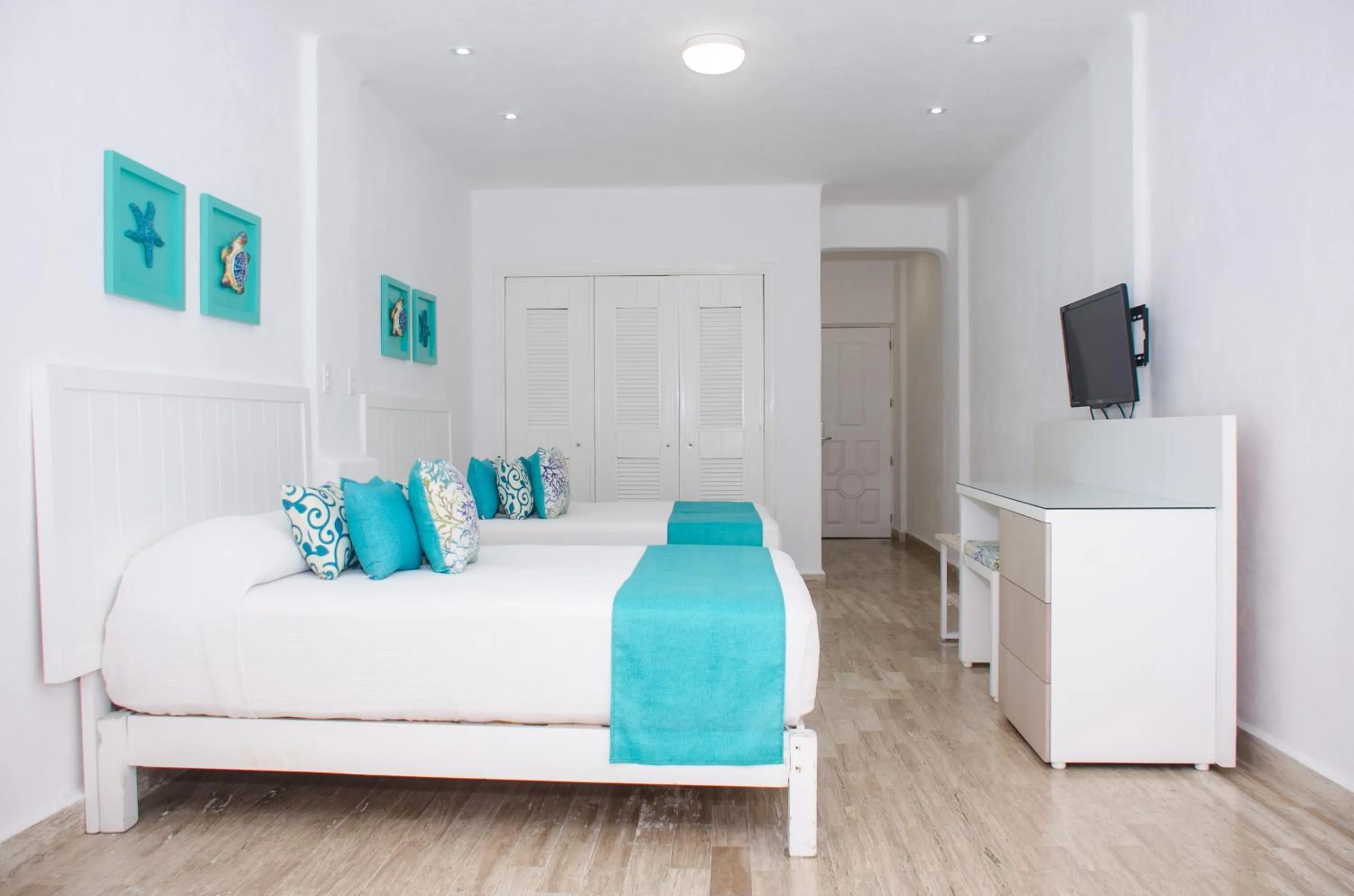 Bed in BSEA Cancun Plaza Hotel