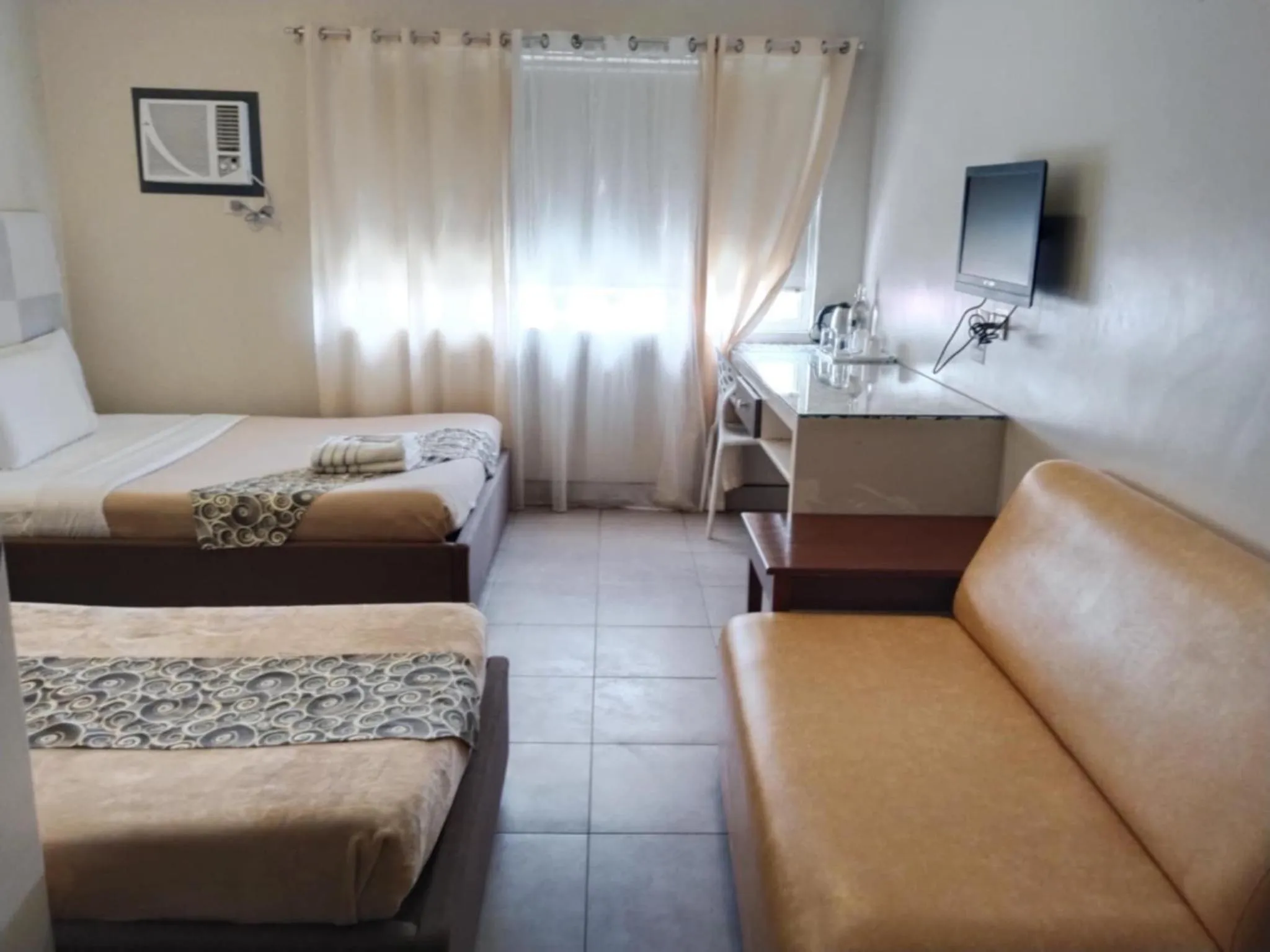 Bed in Grande Vista Hotel