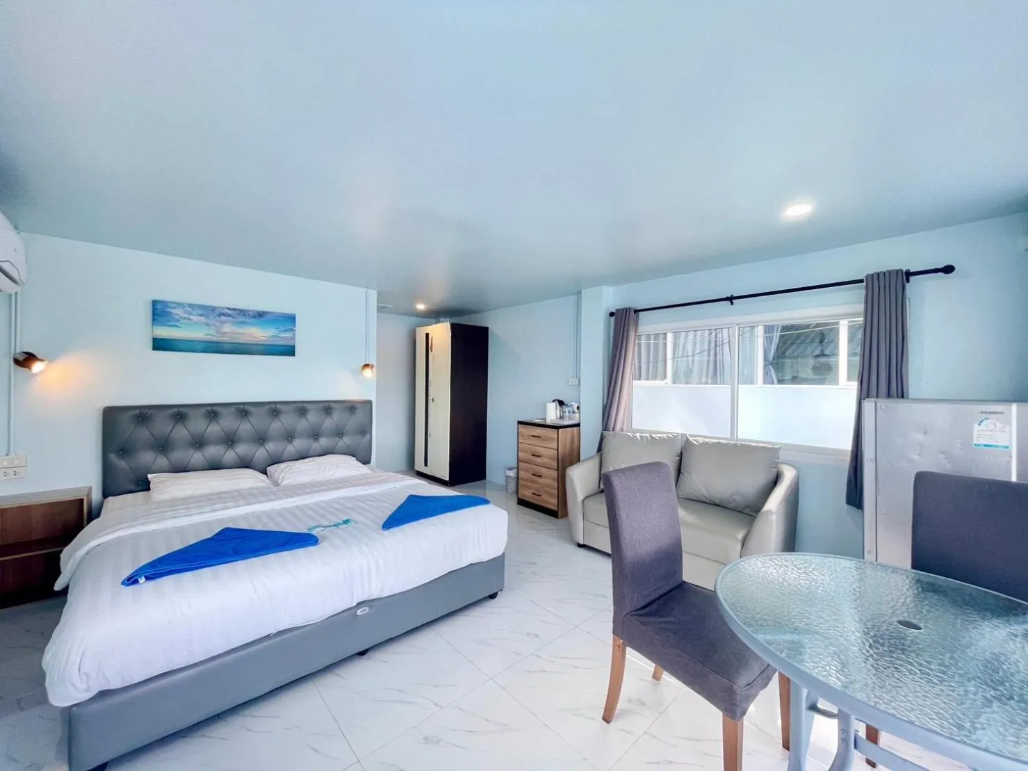 Bed in Naiharn On The Rock Resort Phuket