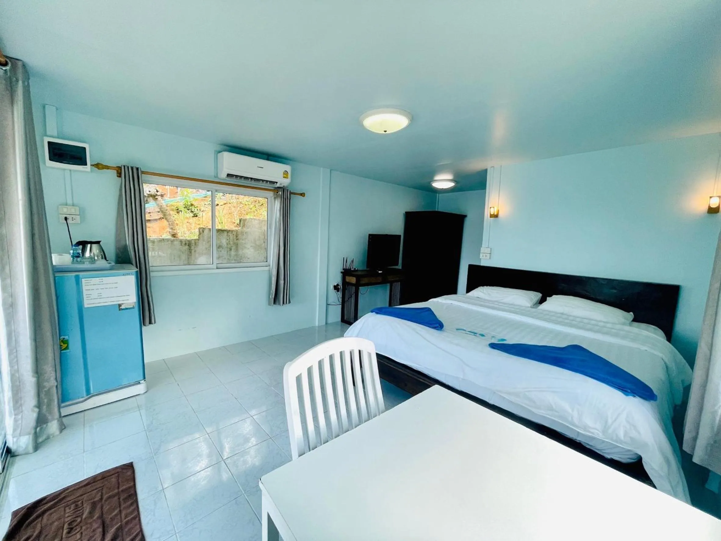 Bed in Naiharn On The Rock Resort Phuket