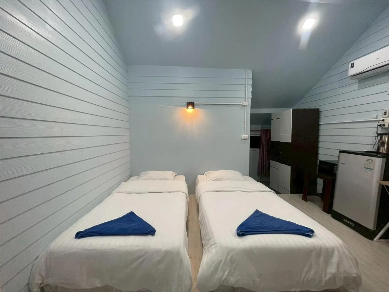 Bed in Naiharn On The Rock Resort Phuket