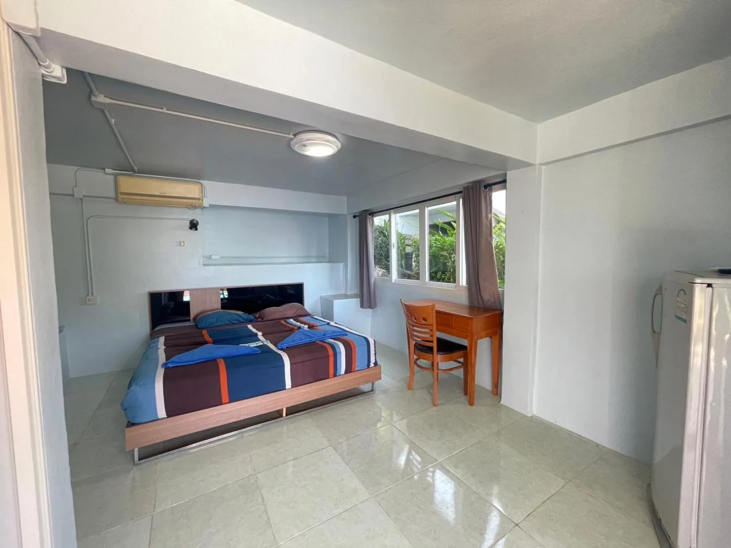 Bed in Naiharn On The Rock Resort Phuket