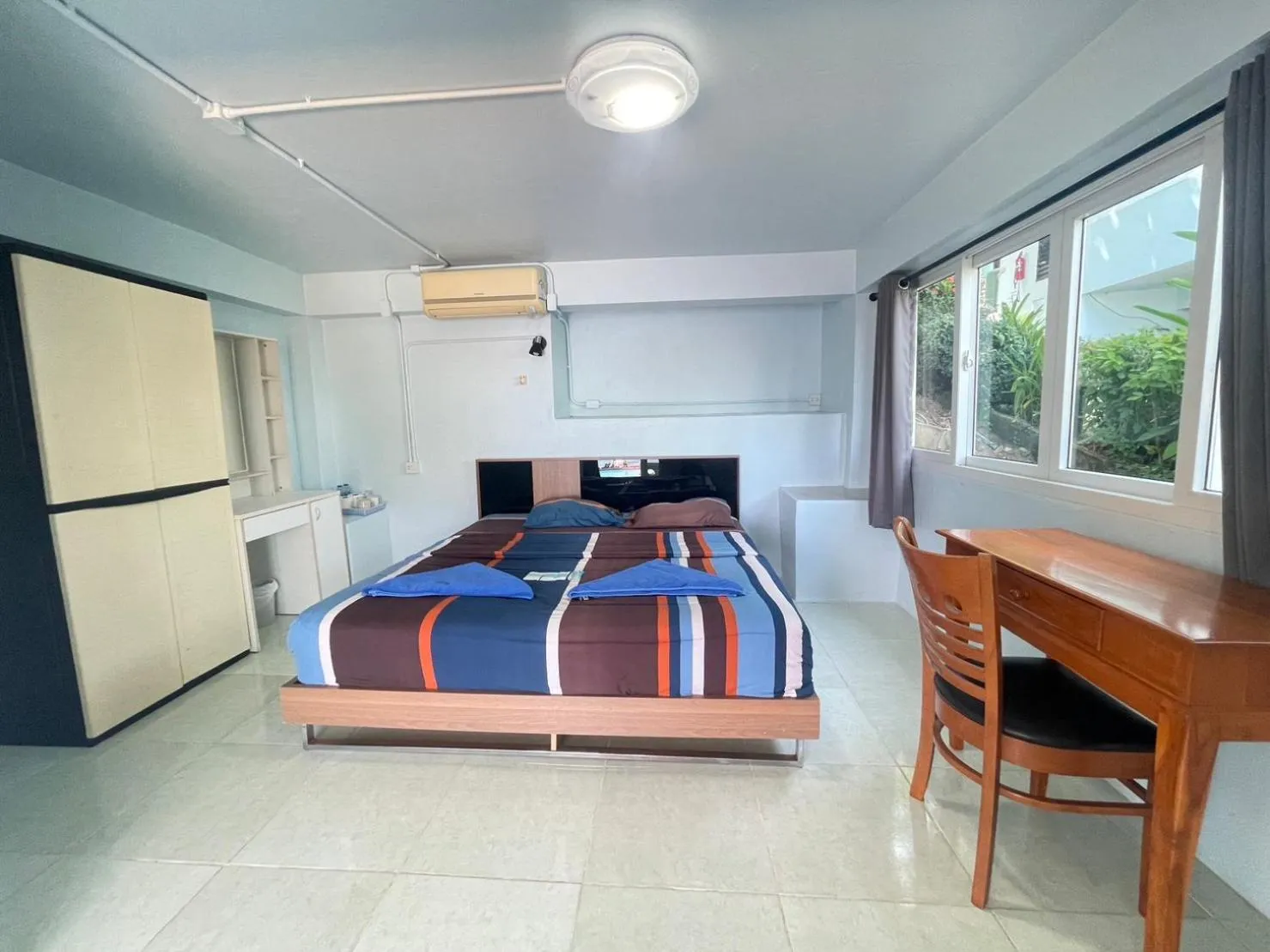 Bed in Naiharn On The Rock Resort Phuket