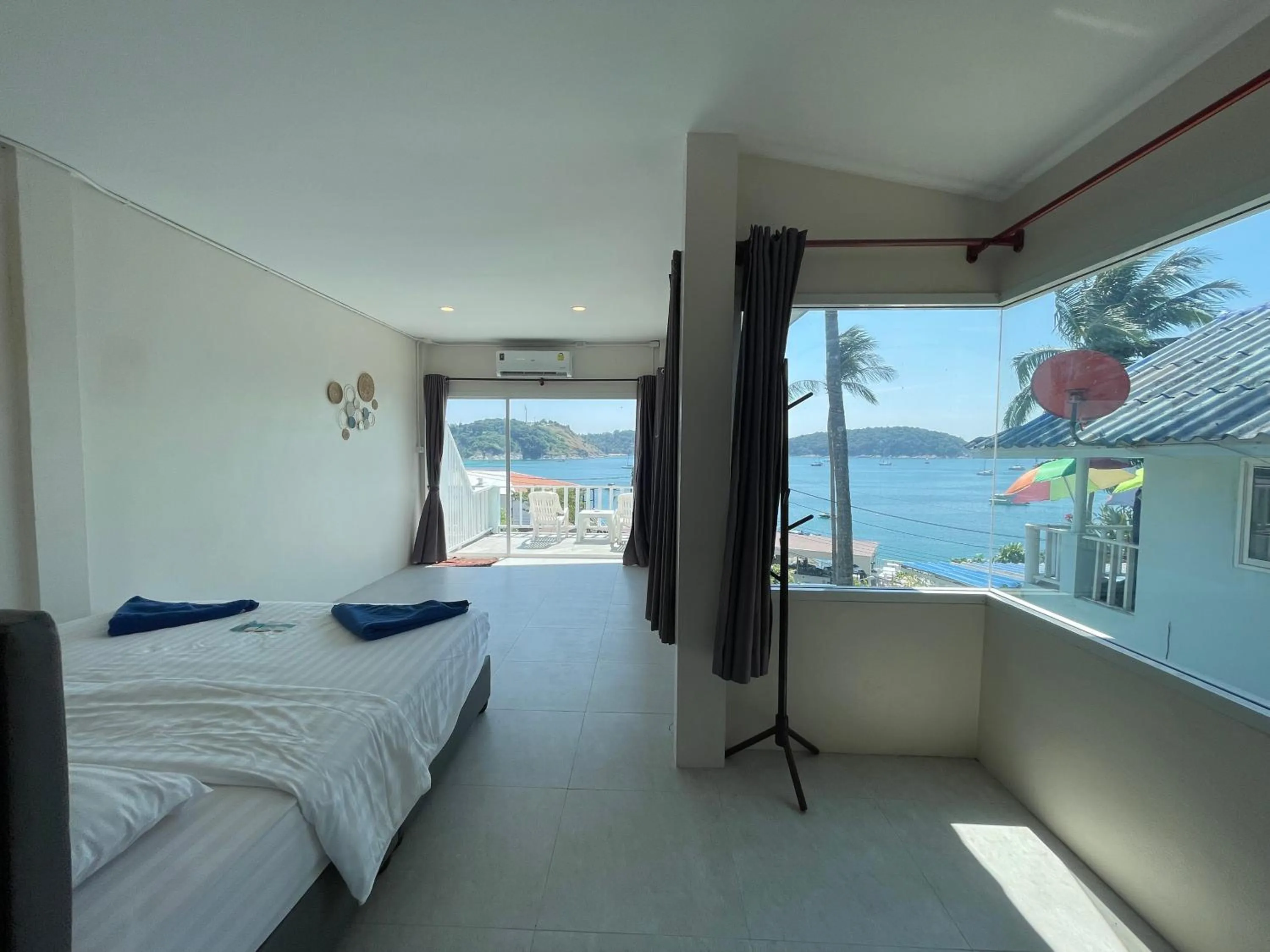 Bed in Naiharn On The Rock Resort Phuket