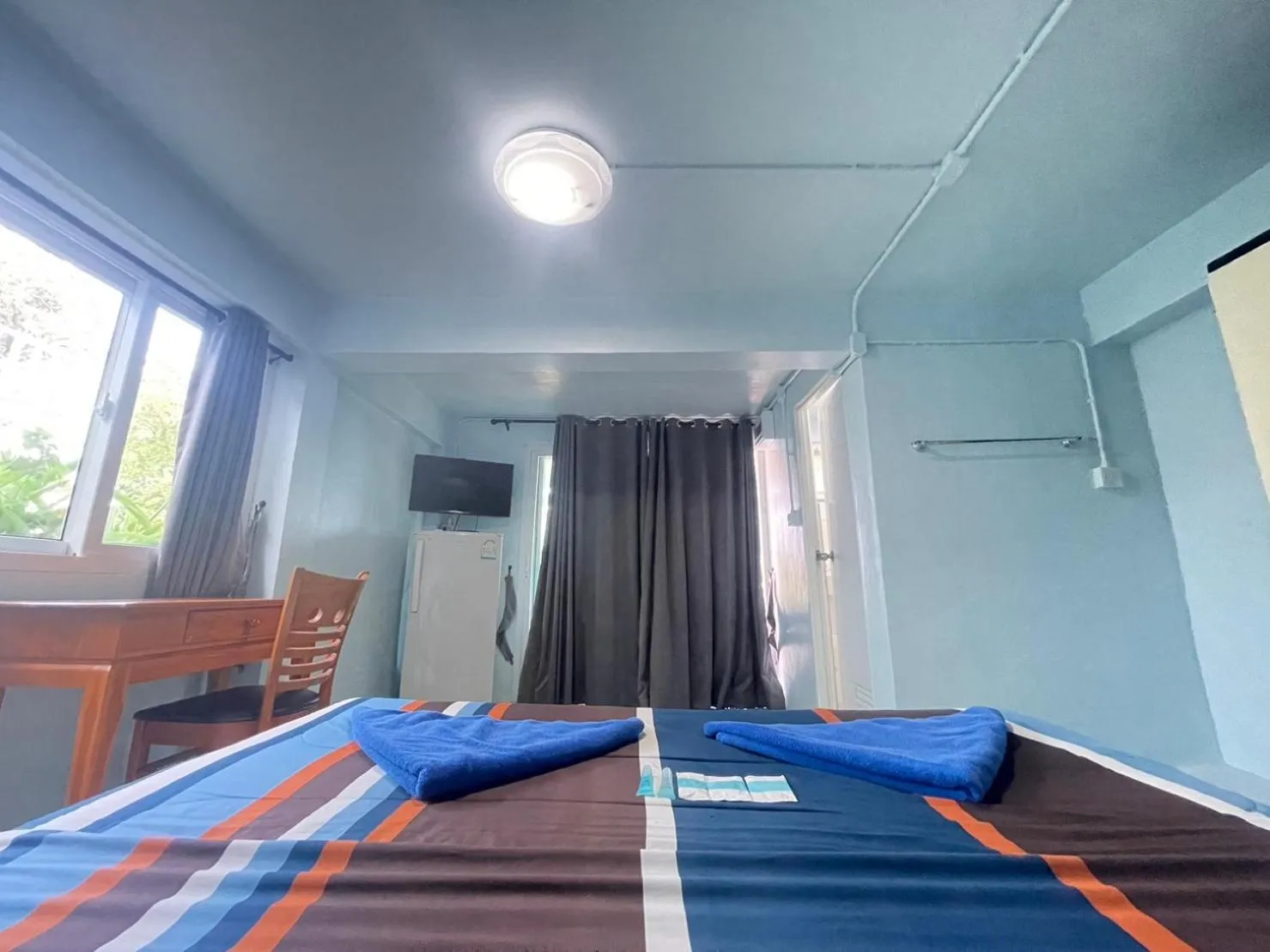 Bed in Naiharn On The Rock Resort Phuket