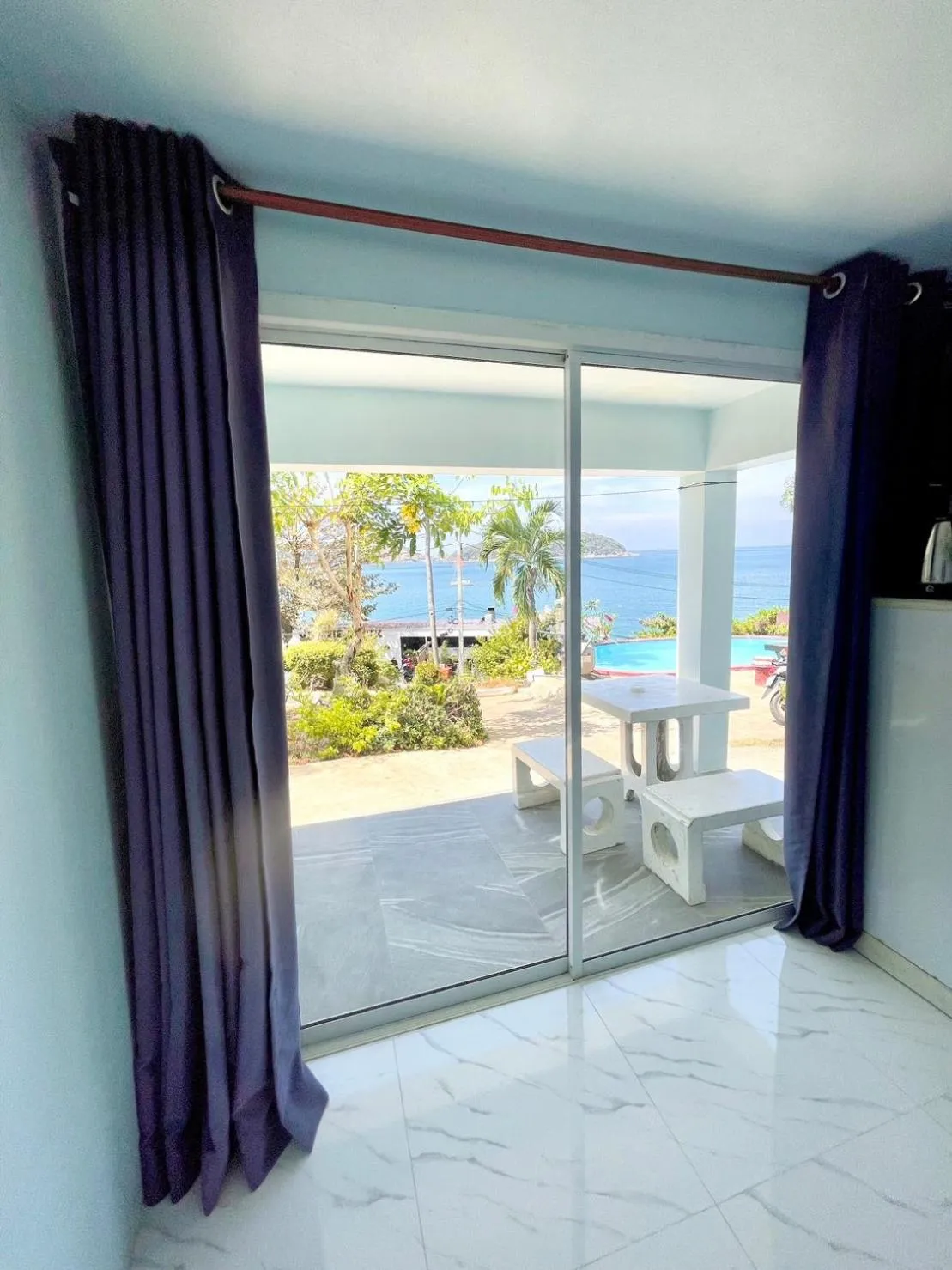 Patio in Naiharn On The Rock Resort Phuket