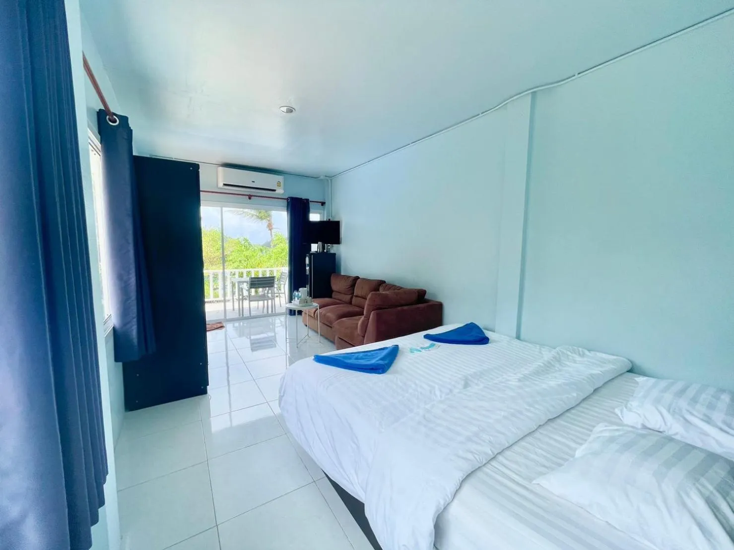 Bed in Naiharn On The Rock Resort Phuket