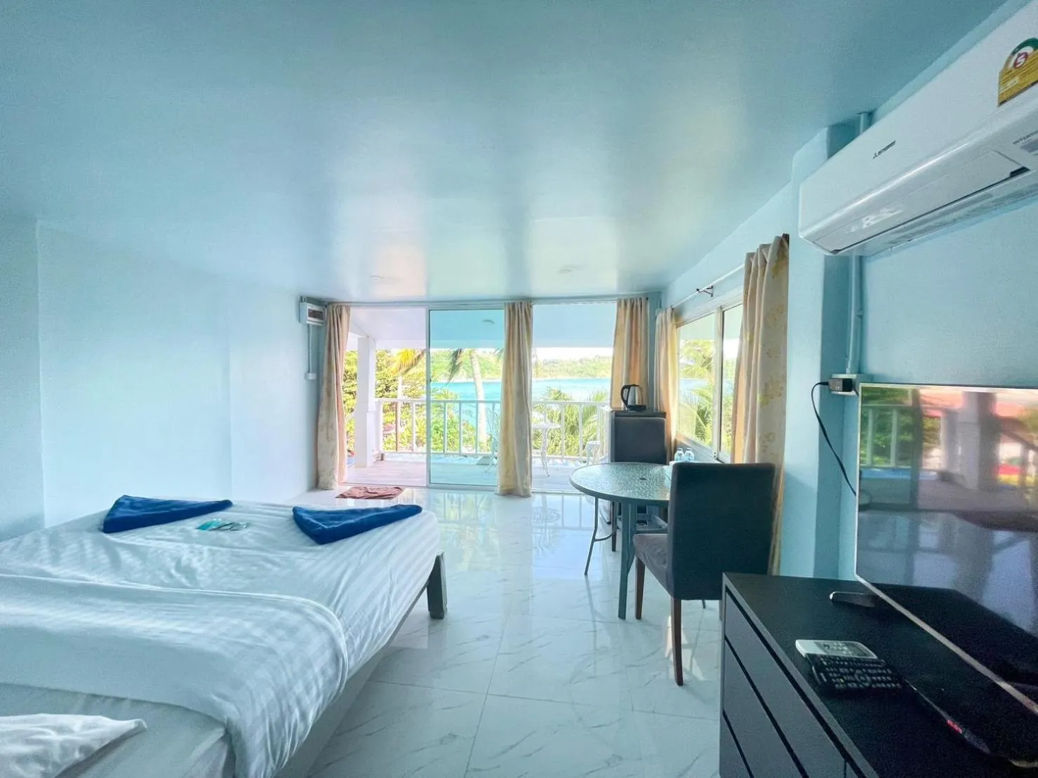 Bed in Naiharn On The Rock Resort Phuket