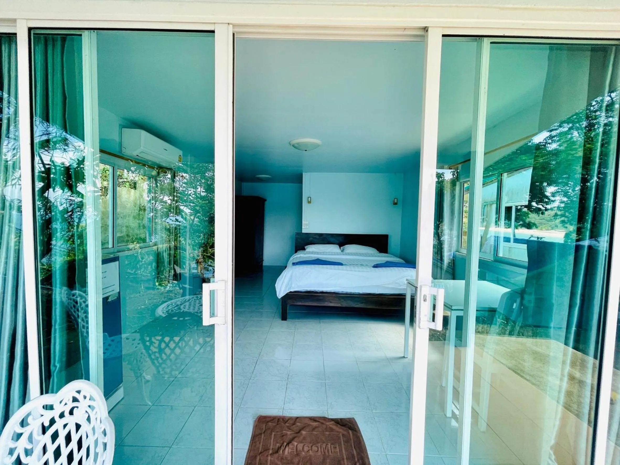 Patio, Bed in Naiharn On The Rock Resort Phuket