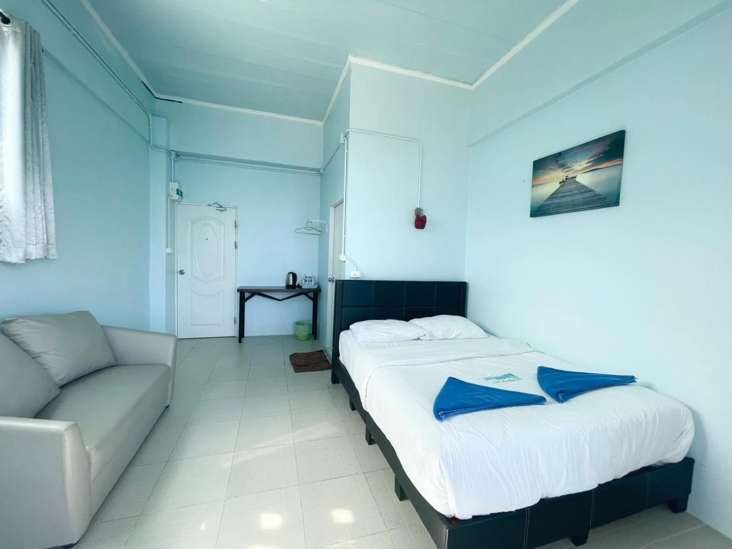 Bed in Naiharn On The Rock Resort Phuket