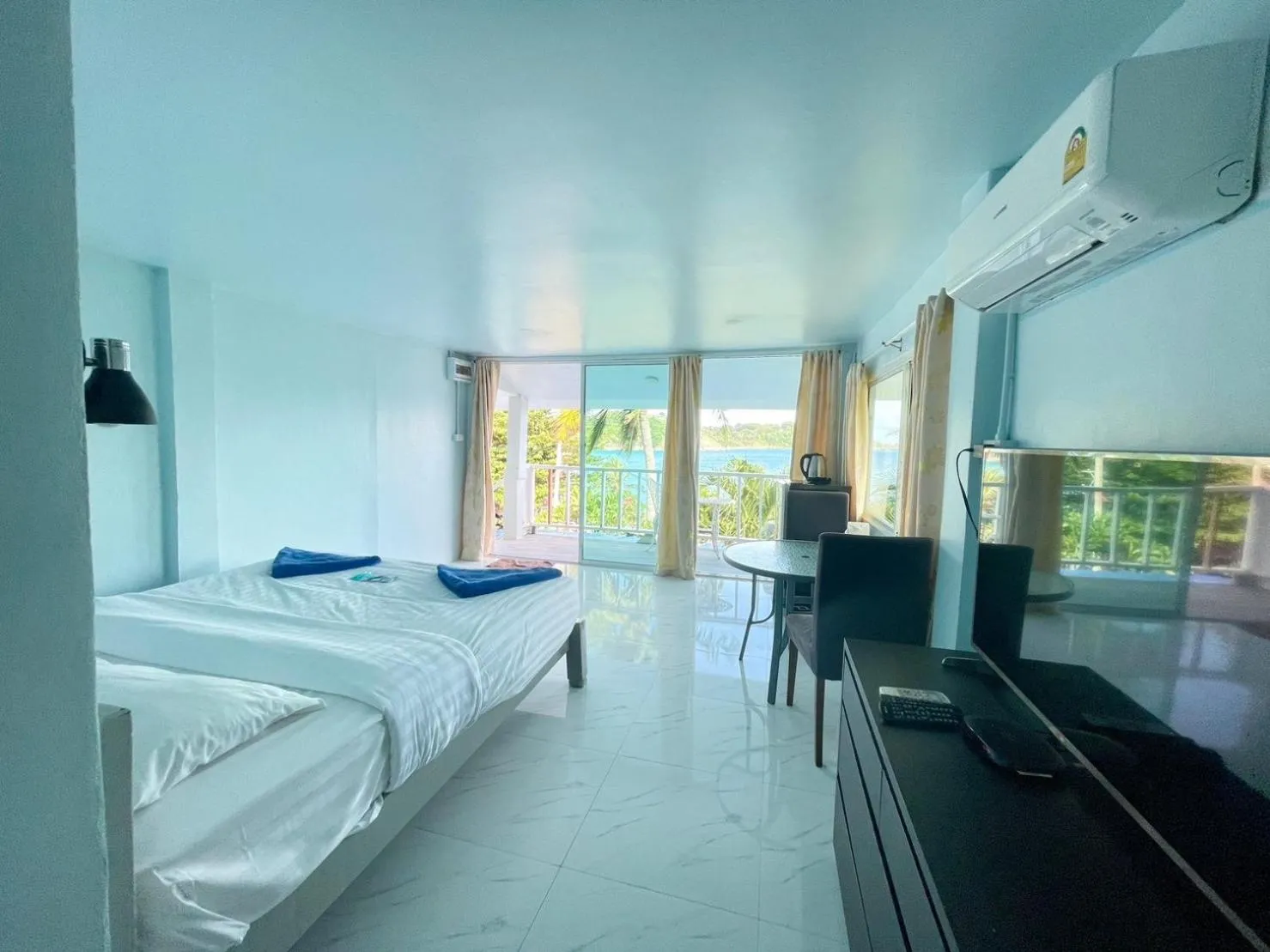 Bed in Naiharn On The Rock Resort Phuket