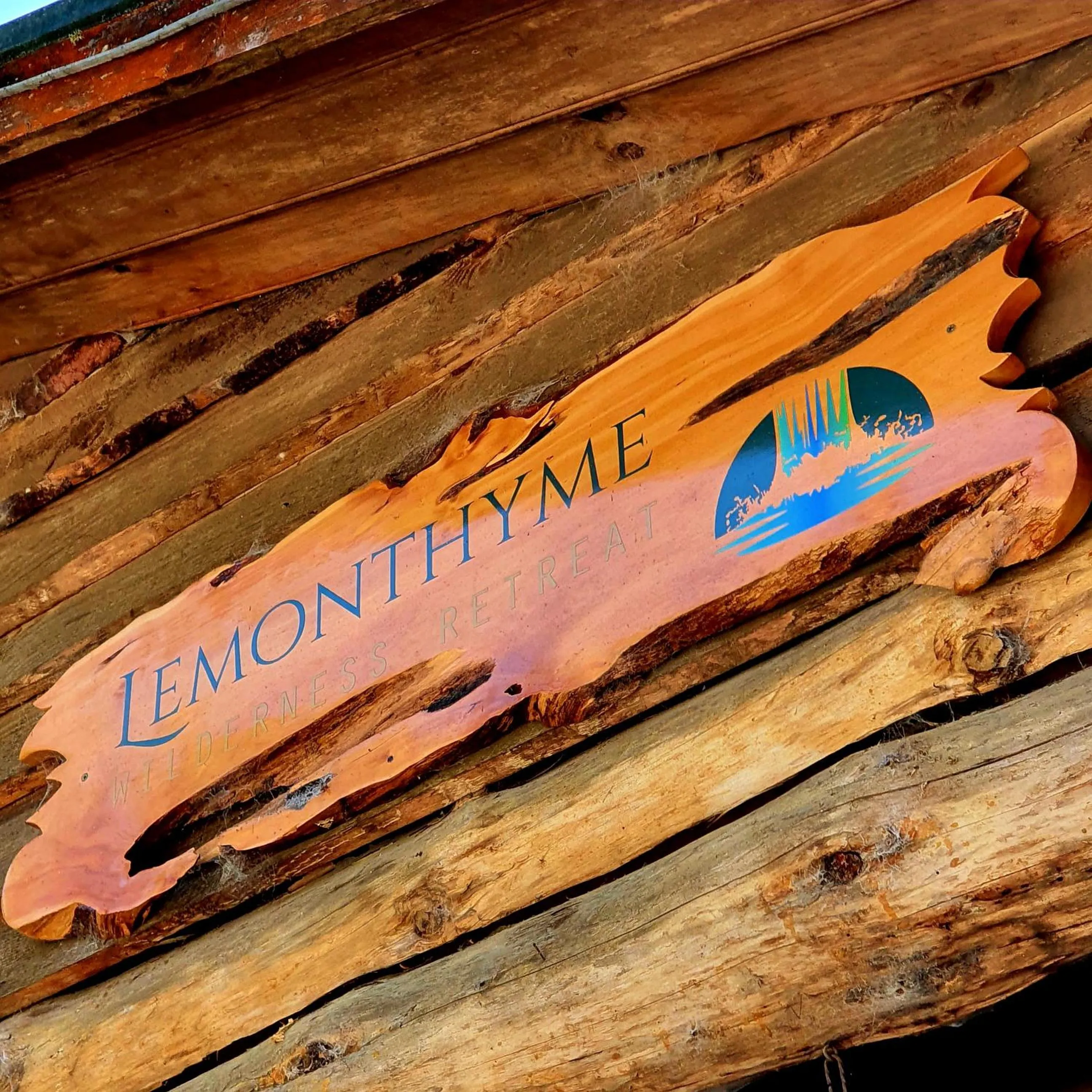 Property logo or sign in Lemonthyme Wilderness Retreat