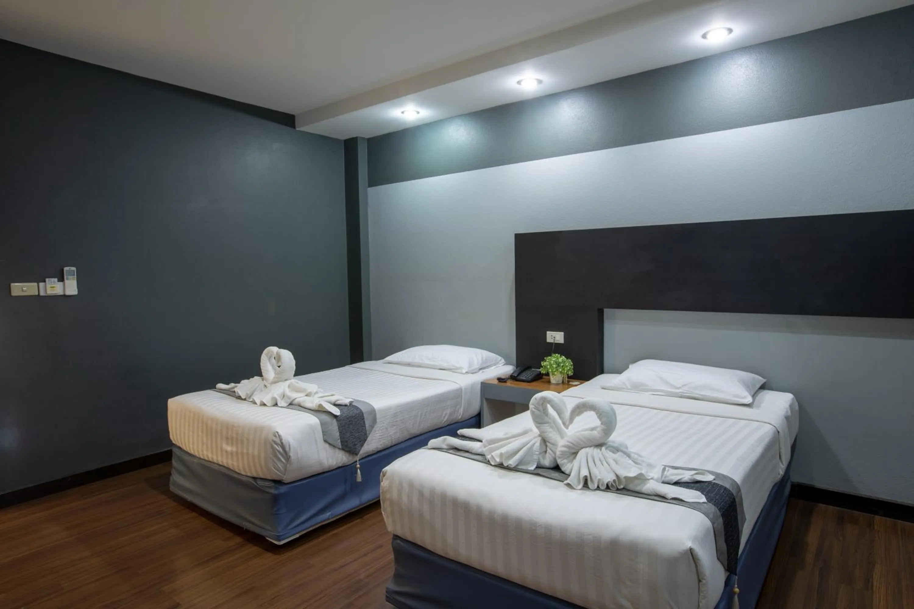 Bed in Pimann Inn Hotel