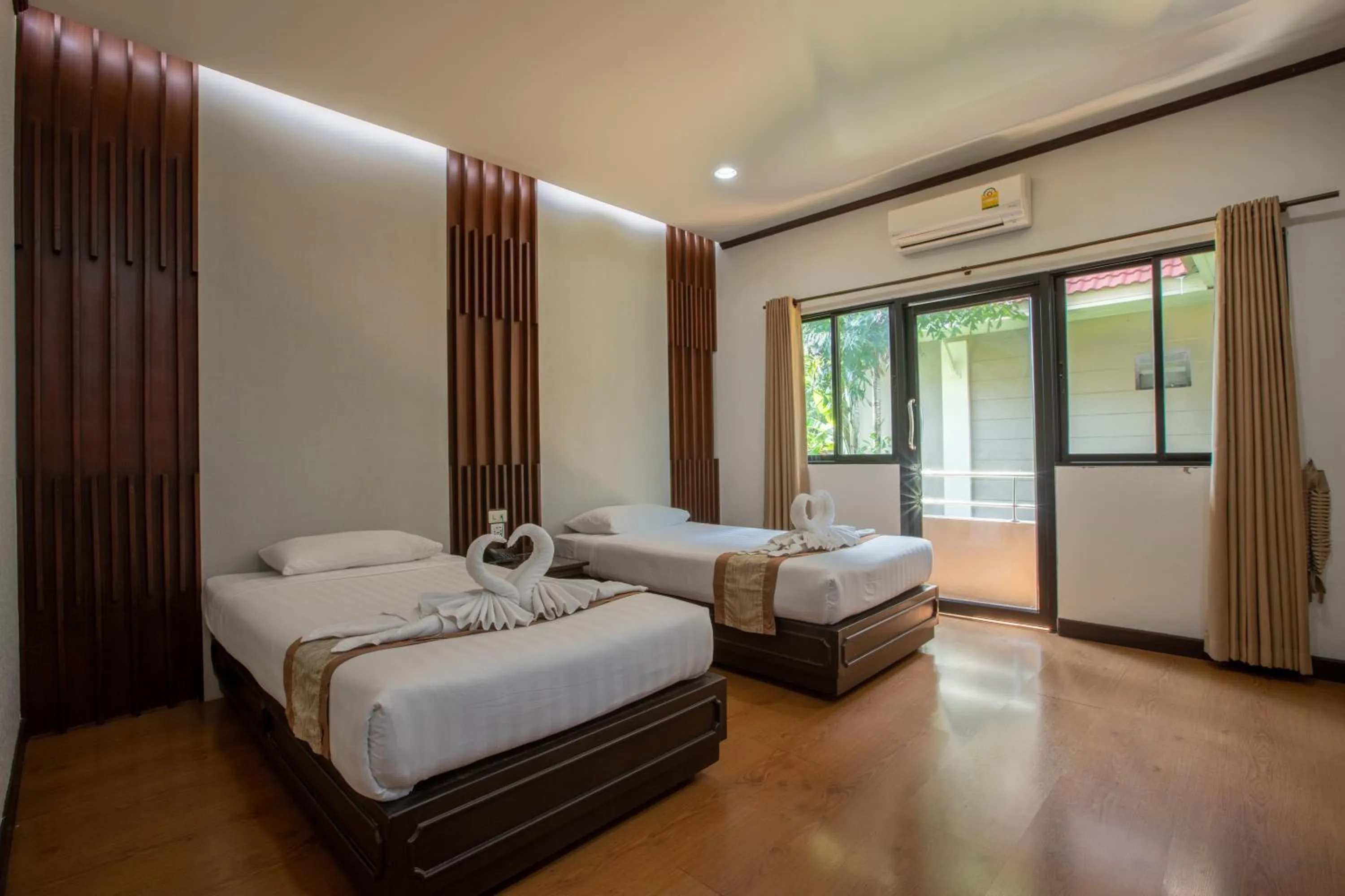 Bed in Pimann Inn Hotel