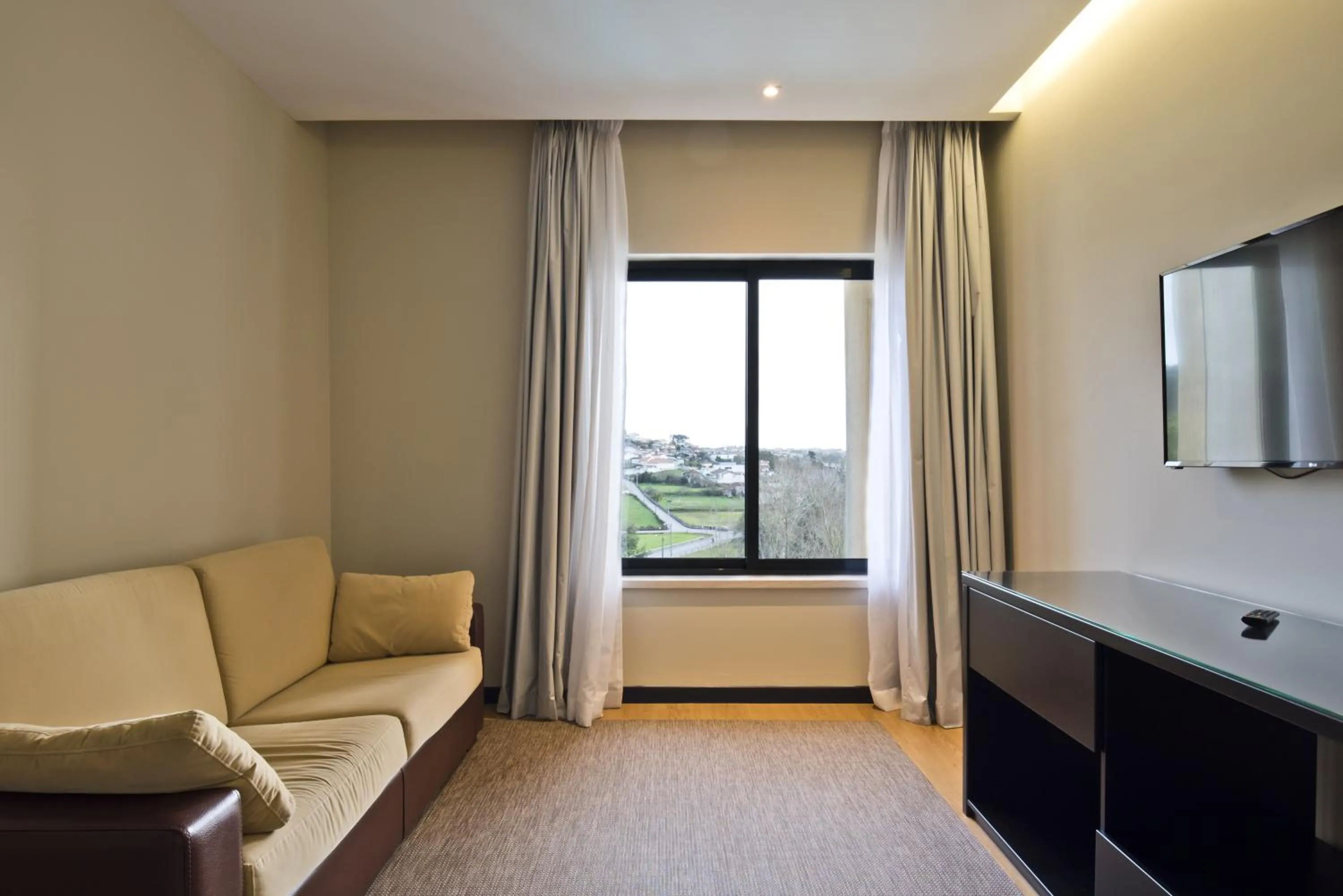 Living room in Lam Hotel Estarreja