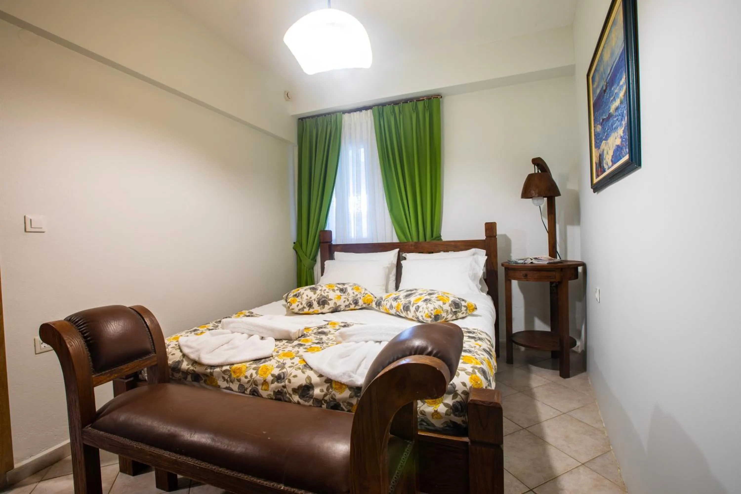 Bedroom in Kastro Apartments