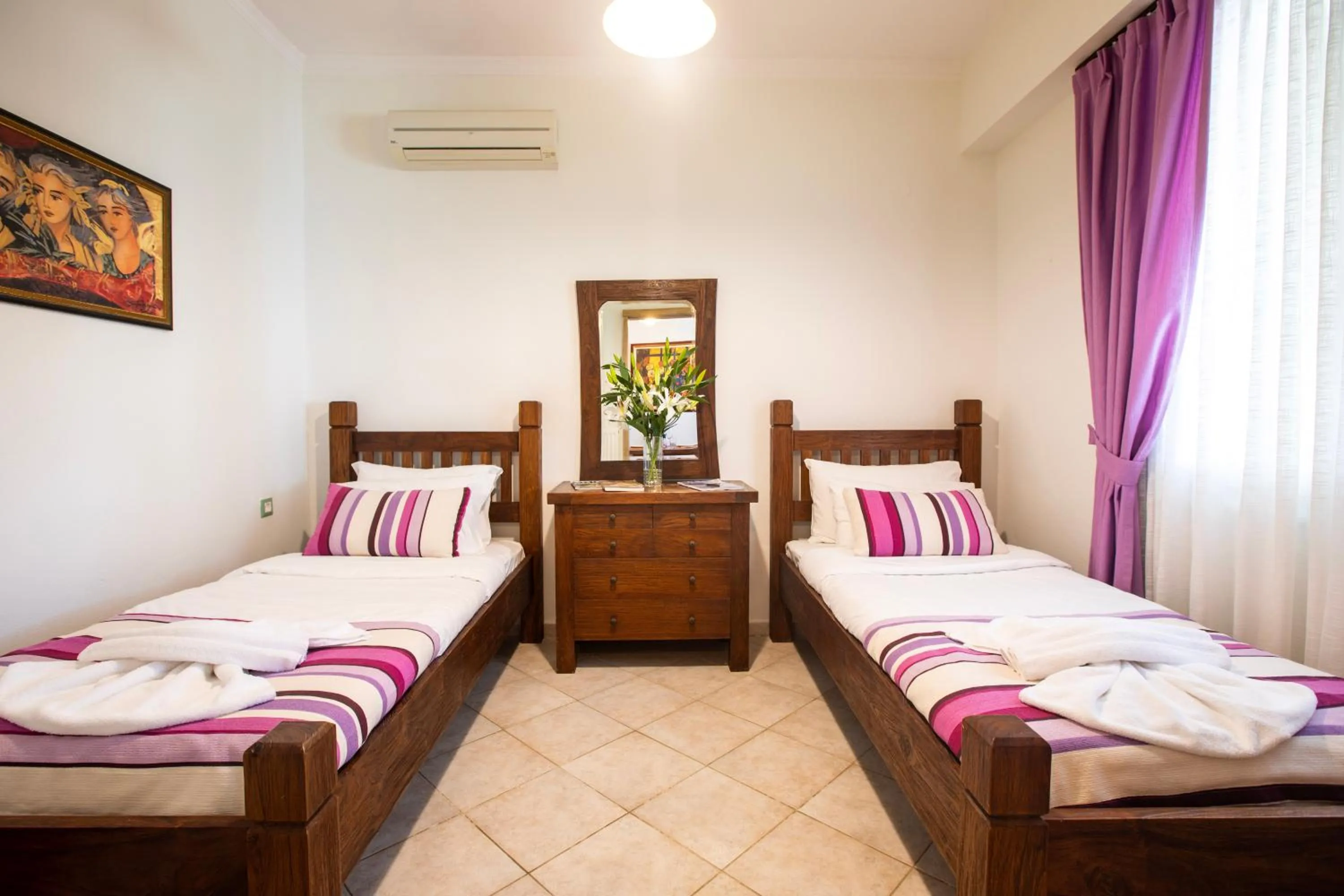 Bedroom in Kastro Apartments