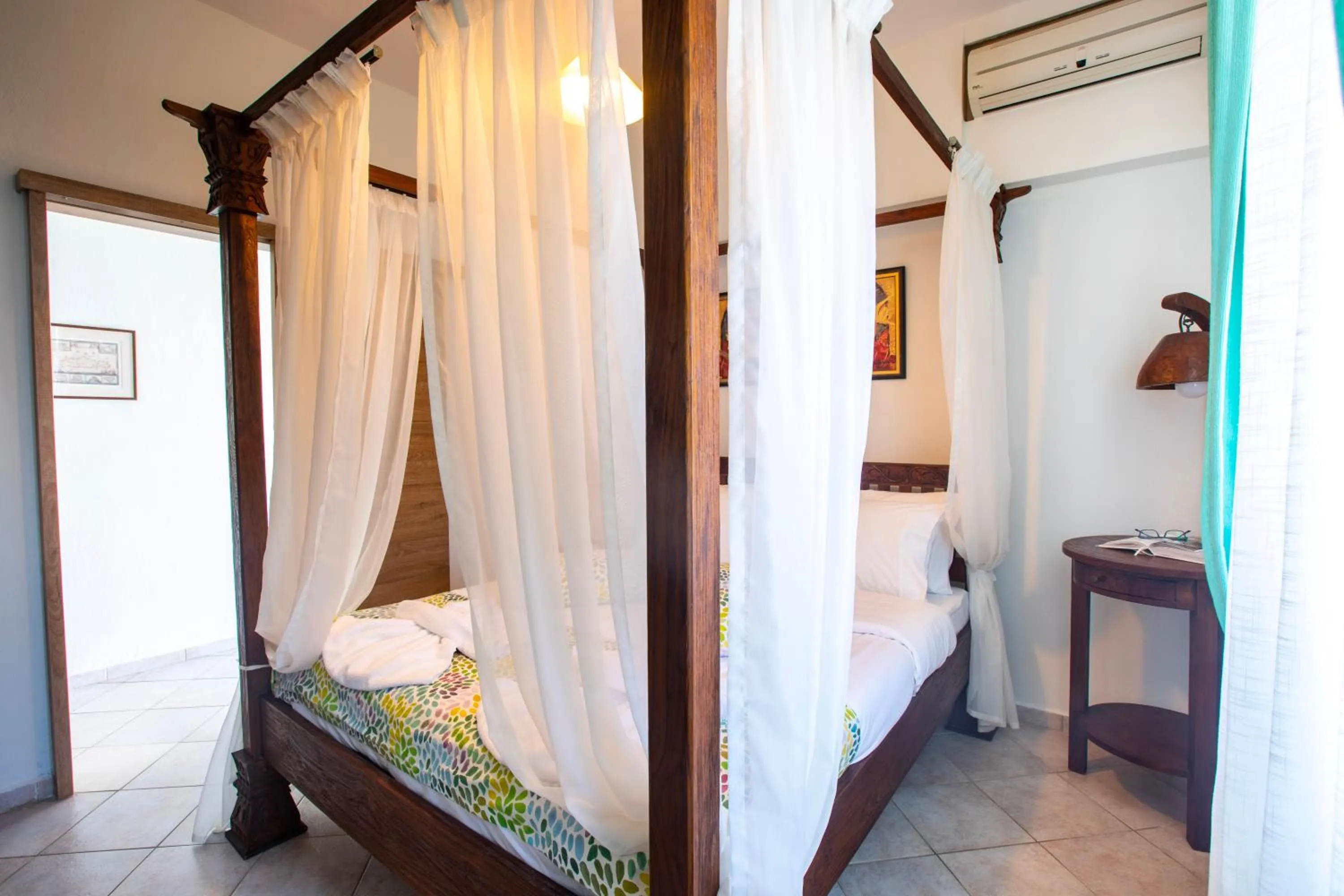 Bedroom in Kastro Apartments